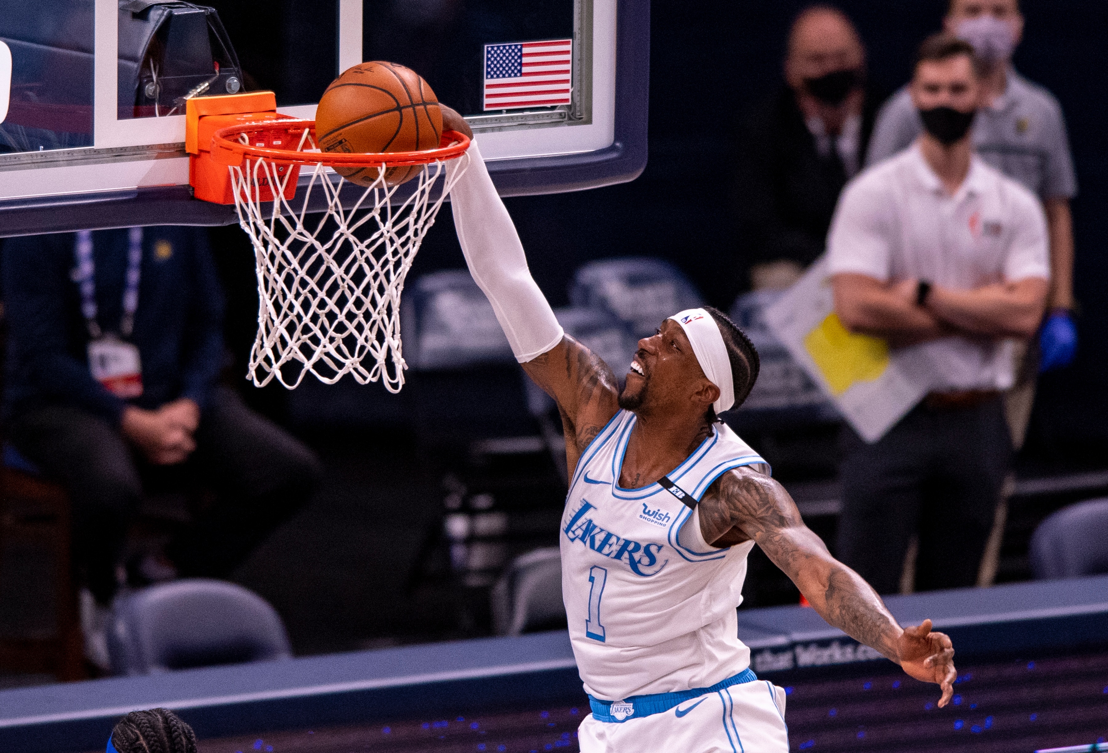 Los Angeles Lakers guard Kentavious Caldwell-Pope (1) takes a shot during the second half of an NBA basketball game against the Indiana Pacers in Indianapolis, Saturday, May 15, 2021. (AP Photo/Doug McSchooler)