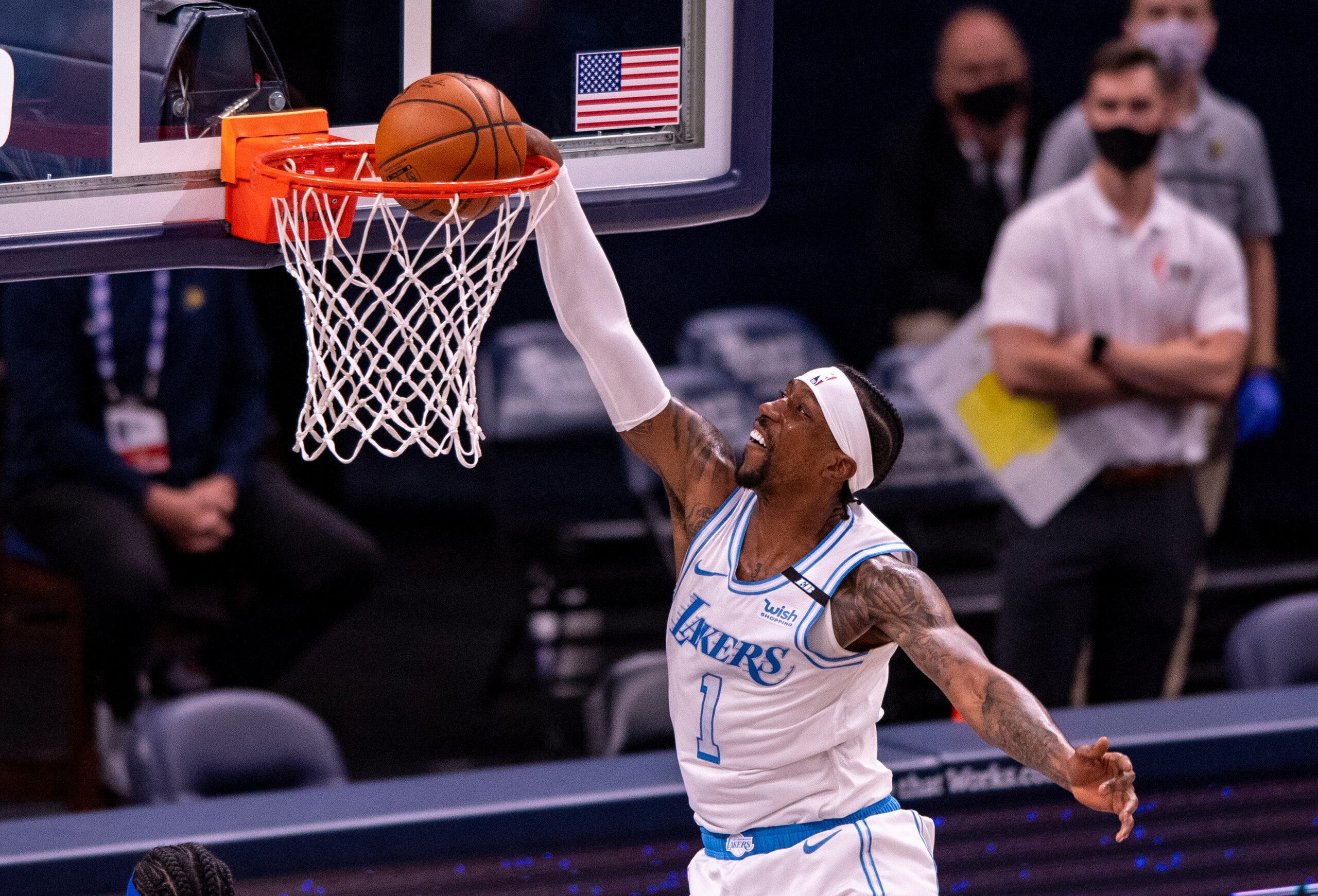 Los Angeles Lakers guard Kentavious Caldwell-Pope (1) takes a shot during the second half of an NBA basketball game against the Indiana Pacers in Indianapolis, Saturday, May 15, 2021. (AP Photo/Doug McSchooler)
