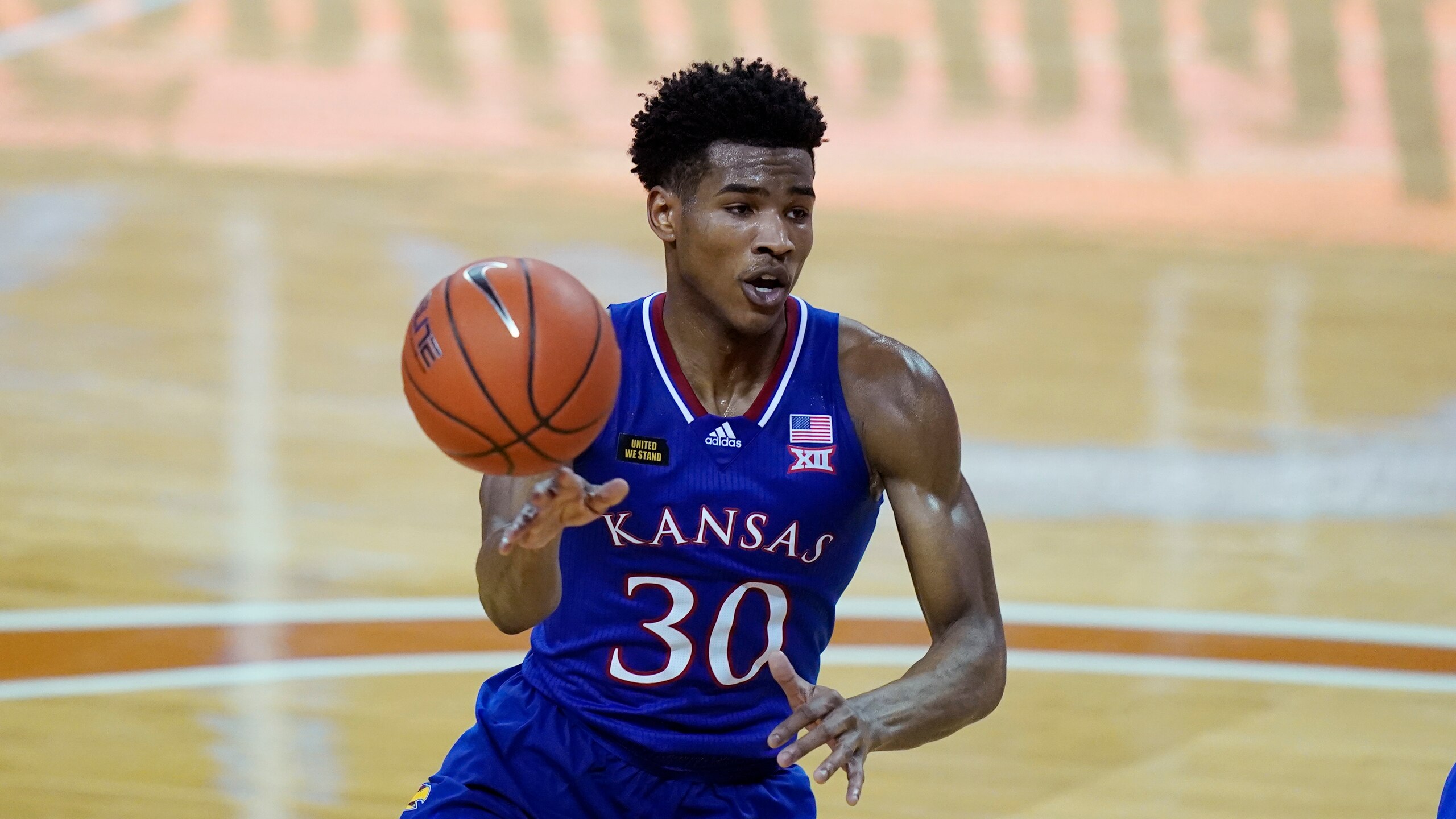 Kansas guard Ochai Agbaji (30) during the second half of an NCAA college basketball game, Tuesday, Feb. 23, 2021, in Austin, Texas. (AP Photo/Eric Gay)