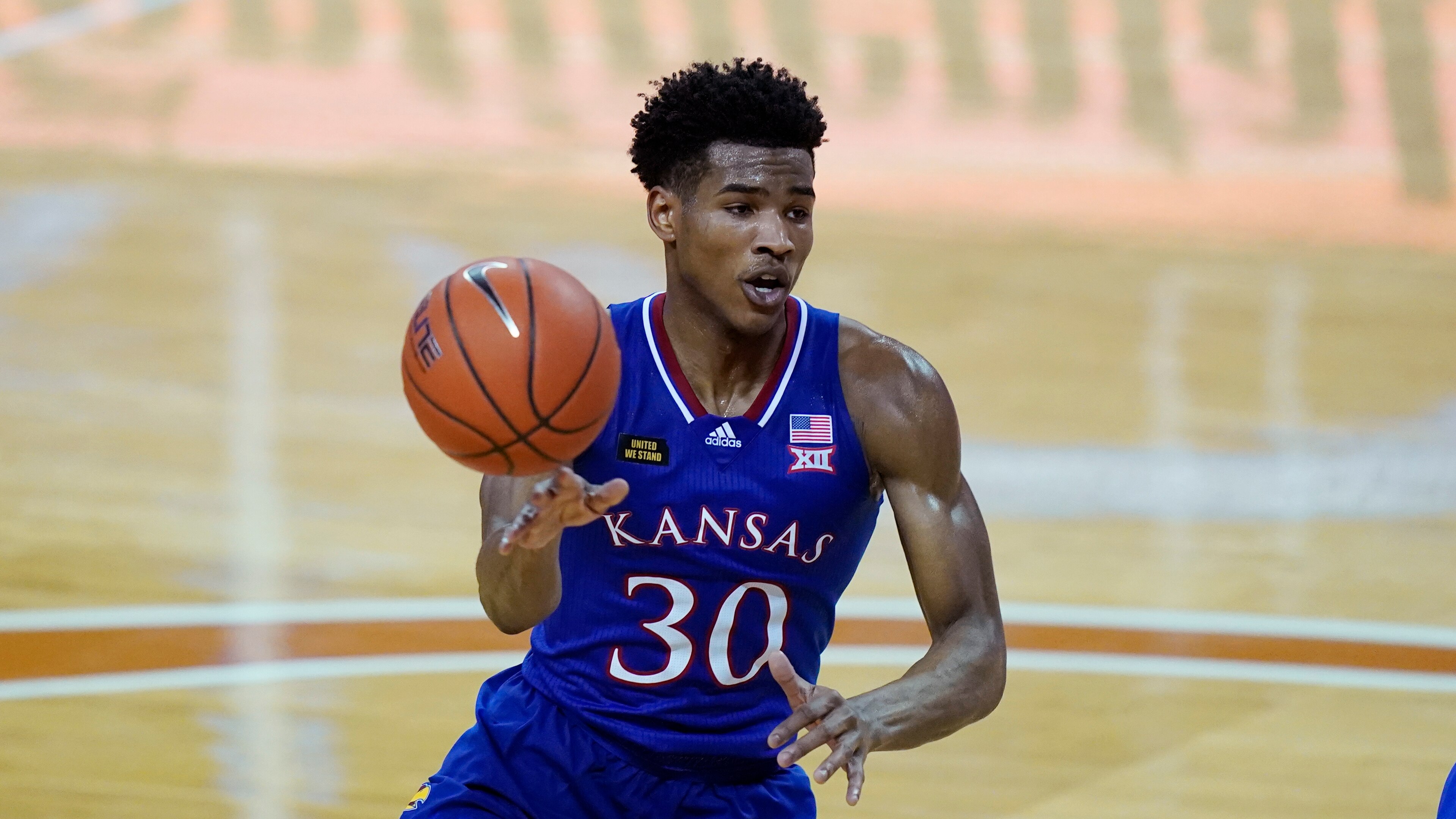 Kansas guard Ochai Agbaji (30) during the second half of an NCAA college basketball game, Tuesday, Feb. 23, 2021, in Austin, Texas. (AP Photo/Eric Gay)