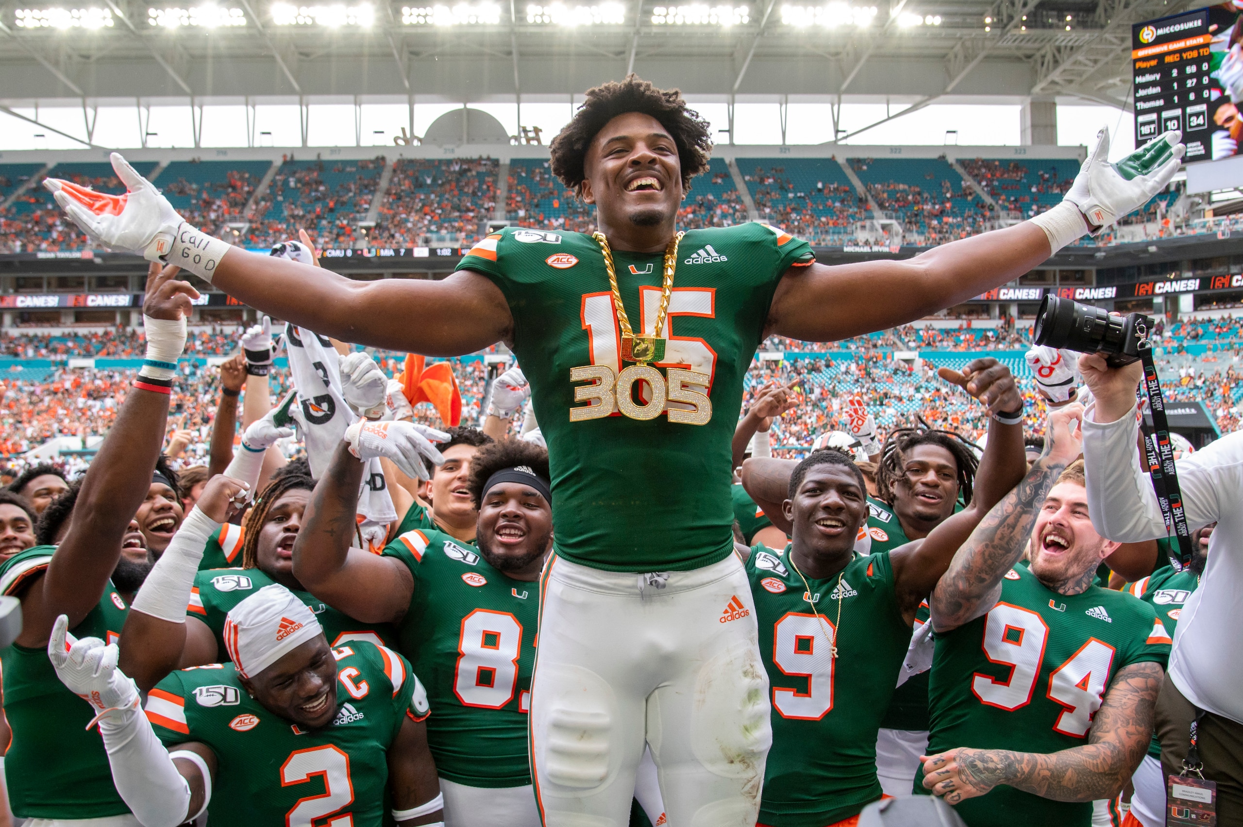 MIAMI GARDENS, FL - SEPTEMBER 21: Miami Hurricanes defensive lineman Gregory Rousseau (15) celebrates with the UM Turnover Chain after causing Central Michigan Chippewas quarterback David Moore (2) to fumble and recovered the ball during the college football game between the Central Michigan Chippewas and the University of Miami Hurricanes on September 21, 2019 at the Hard Rock Stadium in Miami Gardens, Florida. (Photo by Doug Murray/Icon Sportswire via Getty Images)
