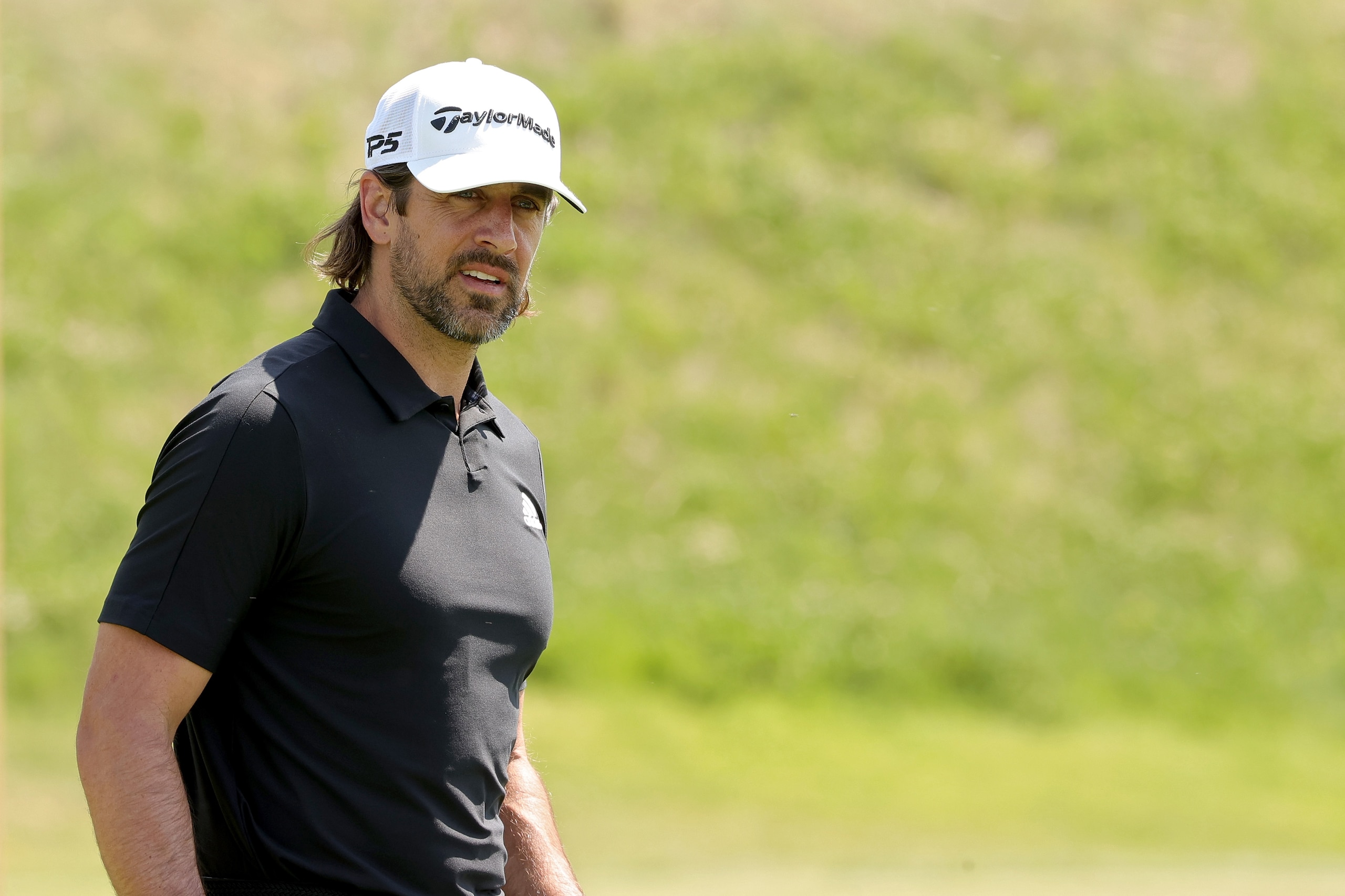BIG SKY, MONTANA - JULY 06: Aaron Rodgers looks on during Capital One's The Match at The Reserve at Moonlight Basin on July 06, 2021 in Big Sky, Montana. (Photo by Stacy Revere/Getty Images for The Match)