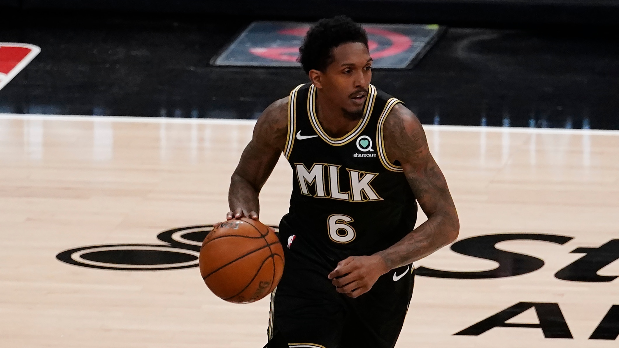 Atlanta Hawks guard Lou Williams (6) is shown against the Milwaukee Bucks during the first half of their NBA Eastern Conference Finals playoff series basketball game Saturday, July 3, 2021, in Atlanta. (AP Photo/John Bazemore)