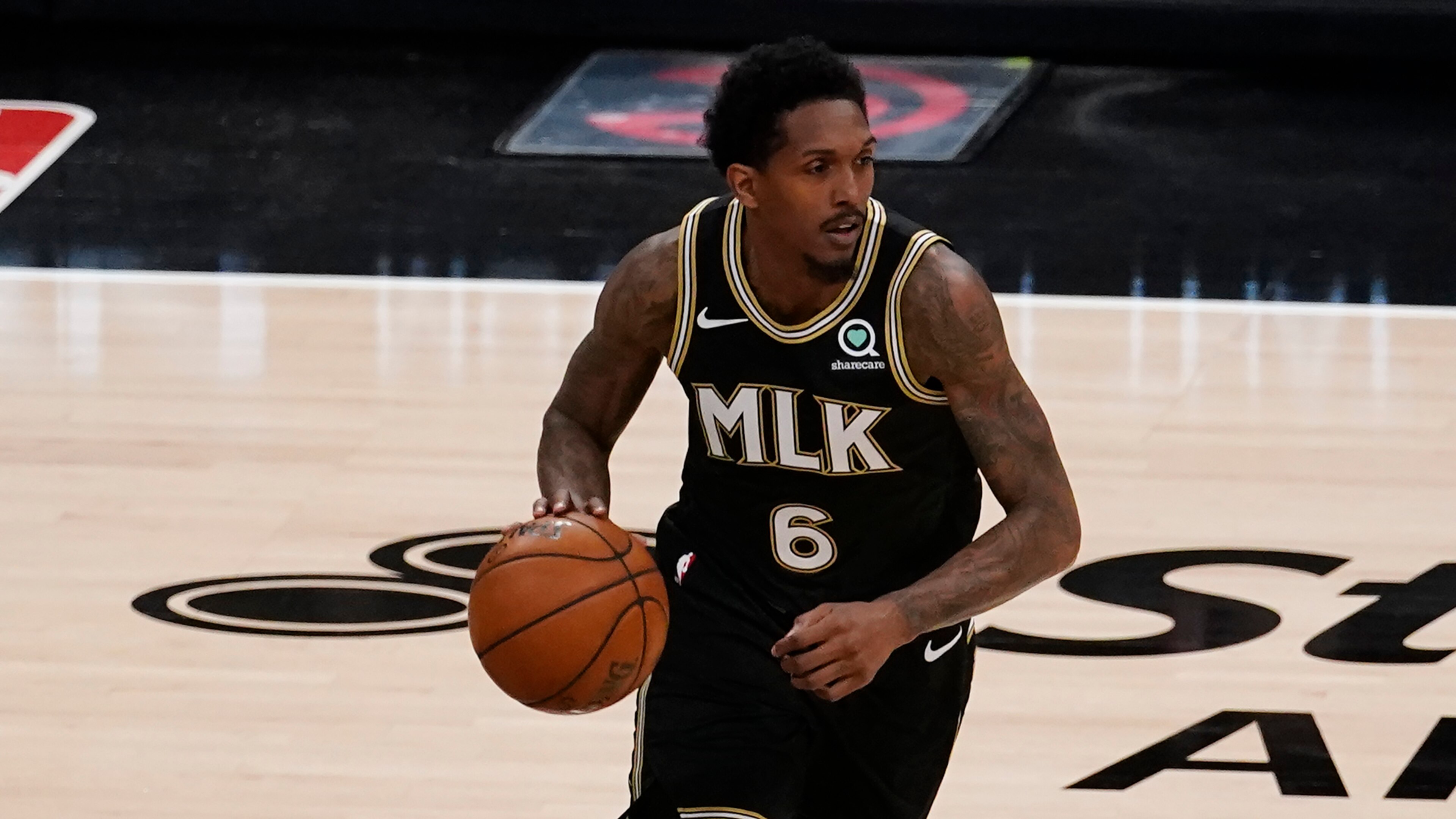 Atlanta Hawks guard Lou Williams (6) is shown against the Milwaukee Bucks during the first half of their NBA Eastern Conference Finals playoff series basketball game Saturday, July 3, 2021, in Atlanta. (AP Photo/John Bazemore)
