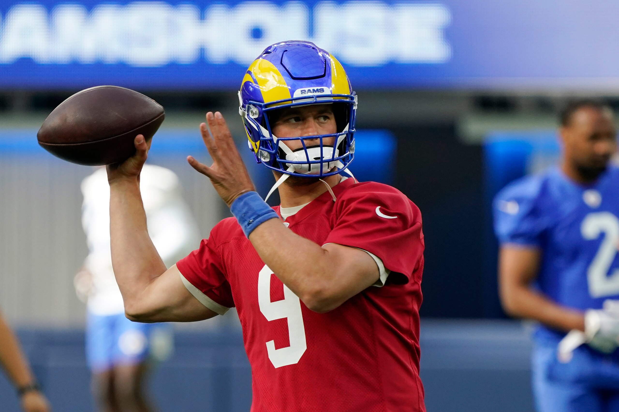 Los Angeles Rams quarterback Matthew Stafford throws during NFL football camp Thursday, June 10, 2021, in Inglewood, Calif. (AP Photo/Marcio Jose Sanchez)