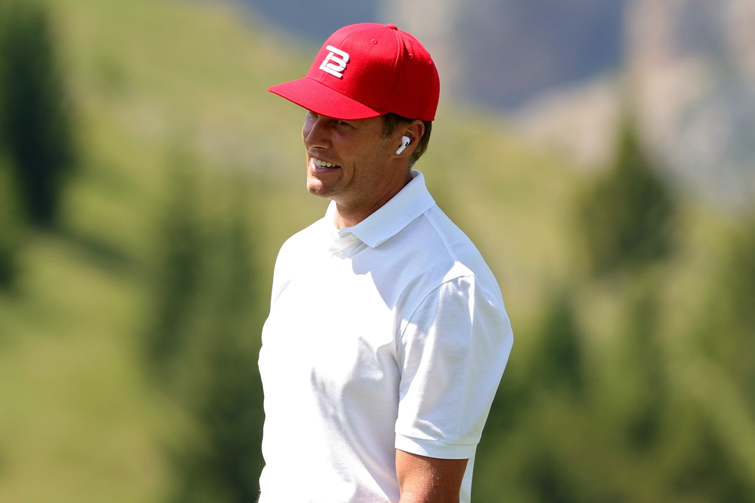 BIG SKY, MONTANA - JULY 06: Tom Brady looks on during Capital One's The Match at The Reserve at Moonlight Basin on July 06, 2021 in Big Sky, Montana. (Photo by Stacy Revere/Getty Images for The Match)