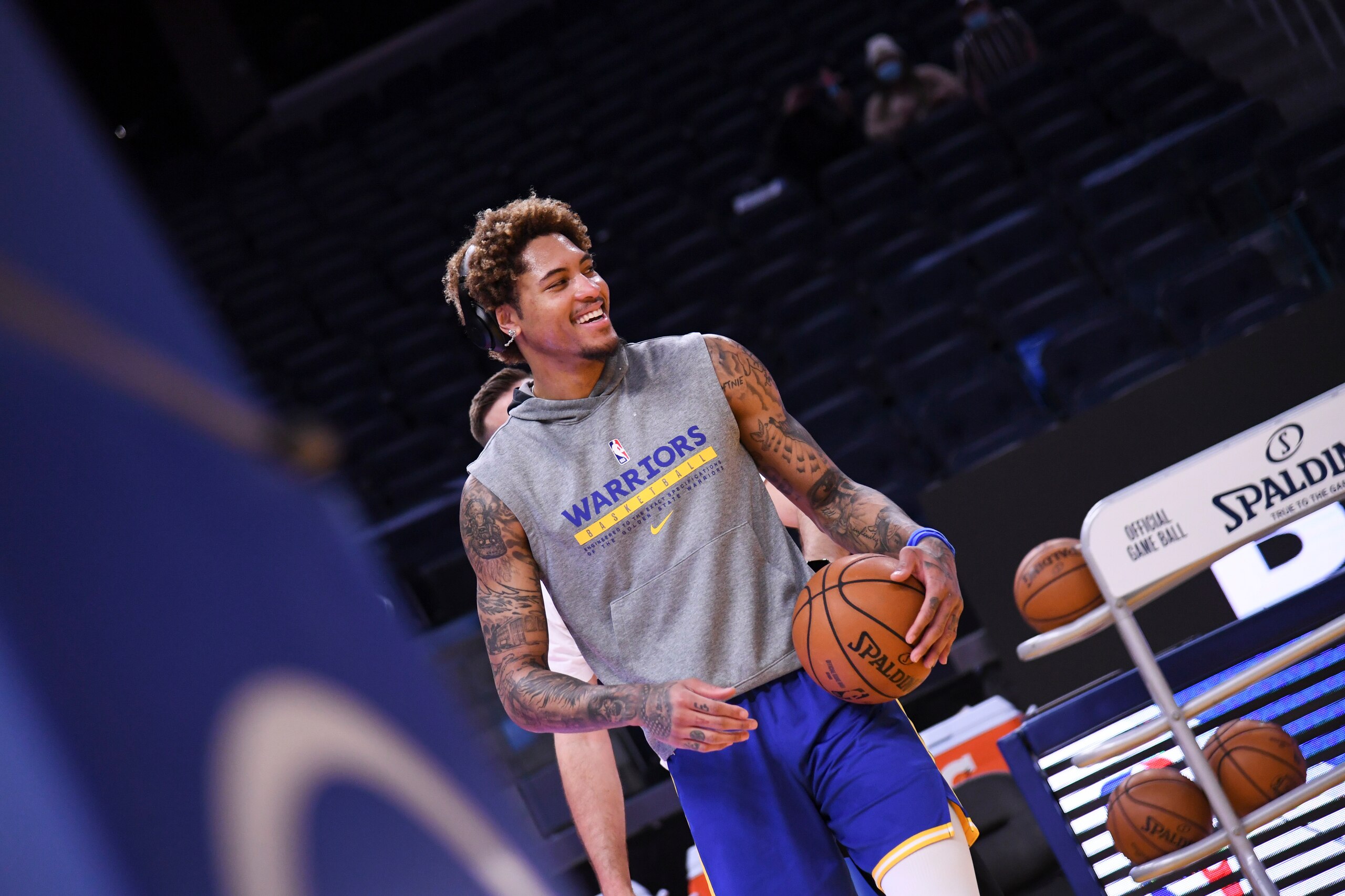 SAN FRANCISCO, CA - APRIL 27: Kelly Oubre Jr. #12 of the Golden State Warriors smiles before the game against the Dallas Mavericks on April 27, 2021 at Chase Center in San Francisco, California. NOTE TO USER: User expressly acknowledges and agrees that, by downloading and or using this photograph, user is consenting to the terms and conditions of Getty Images License Agreement. Mandatory Copyright Notice: Copyright 2021 NBAE (Photo by Noah Graham/NBAE via Getty Images)