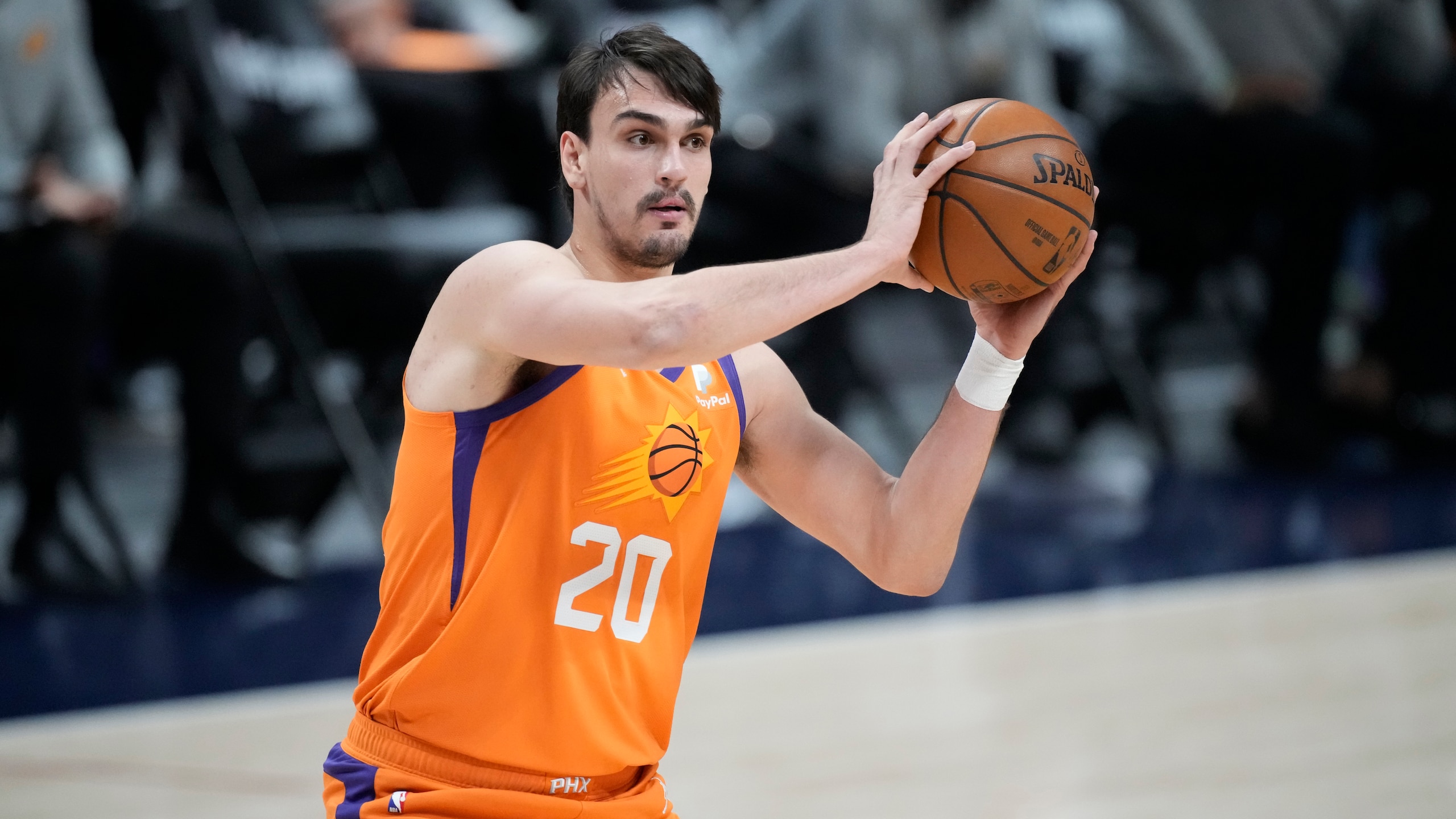 Phoenix Suns forward Dario Saric (20) in the first half of Game 3 of an NBA second-round playoff series Friday, June 11, 2021, in Denver. (AP Photo/David Zalubowski) Phoenix Suns forward Dario Saric (20) in the first half of Game 3 of an NBA second-round playoff series Friday, June 11, 2021, in Denver. (AP Photo/David Zalubowski)