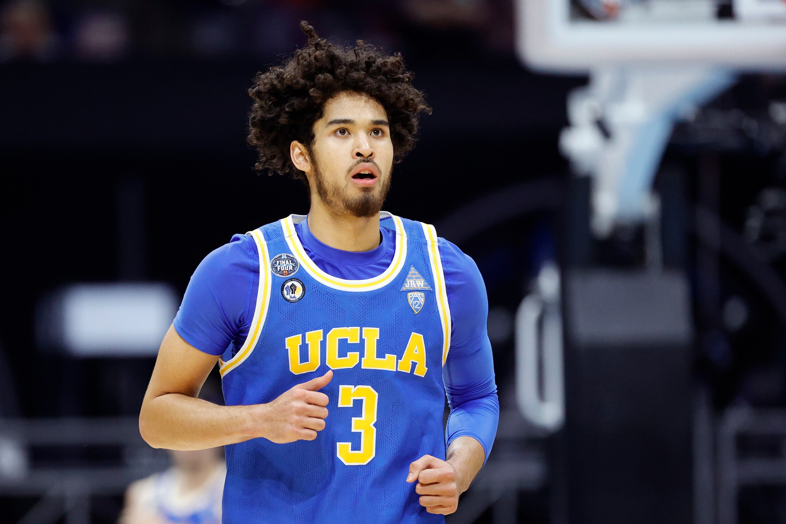 INDIANAPOLIS, INDIANA - APRIL 03: Johnny Juzang #3 of the UCLA Bruins reacts in the second half against the Gonzaga Bulldogs during the 2021 NCAA Final Four semifinal at Lucas Oil Stadium on April 03, 2021 in Indianapolis, Indiana. (Photo by Tim Nwachukwu/Getty Images)