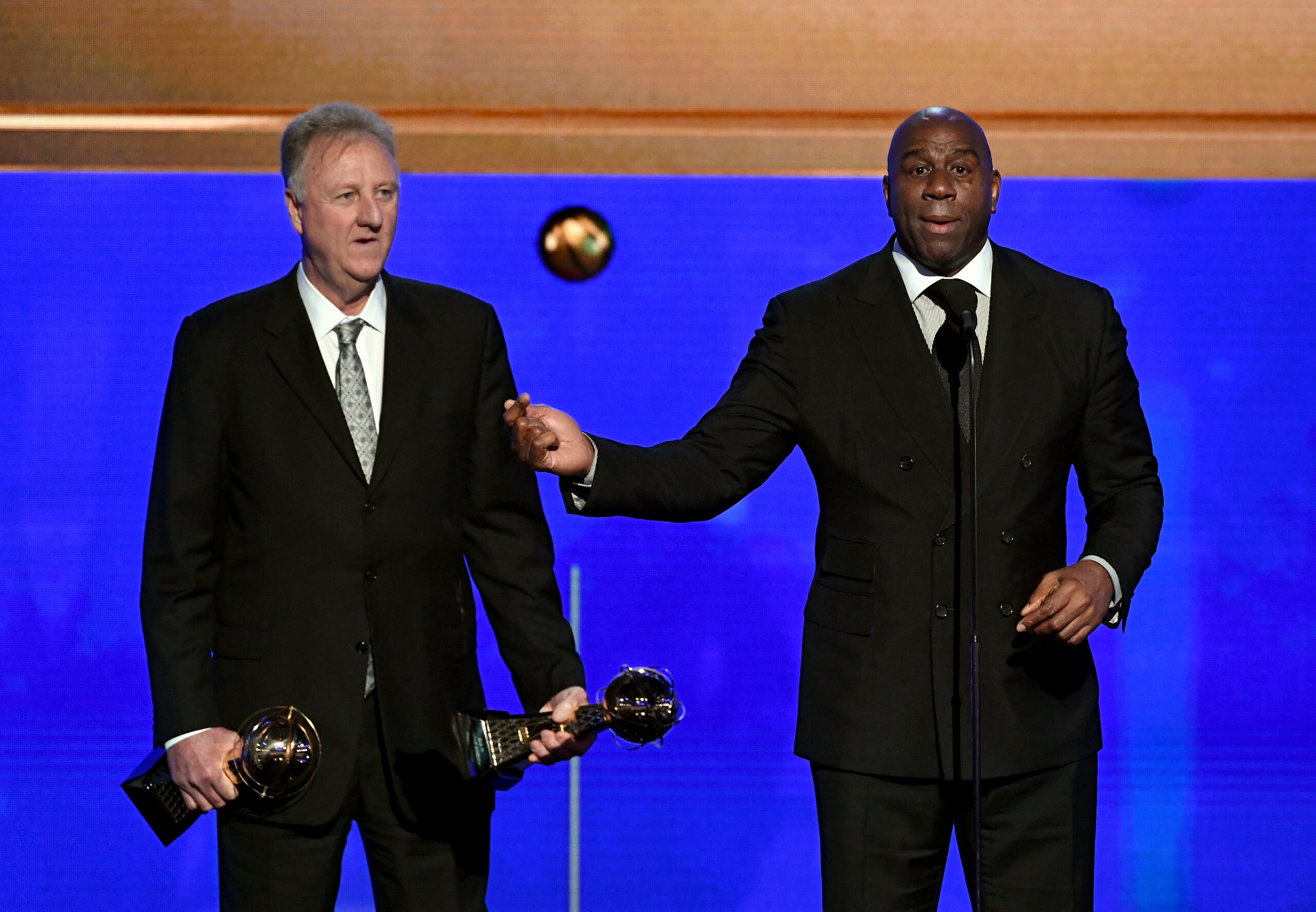 SANTA MONICA, CALIFORNIA - JUNE 24: (L-R) Larry Bird and Magic Johnson accept the Lifetime Achievement Awards onstage during the 2019 NBA Awards presented by Kia on TNT at Barker Hangar on June 24, 2019 in Santa Monica, California. (Photo by Kevin Winter/Getty Images for Turner Sports)