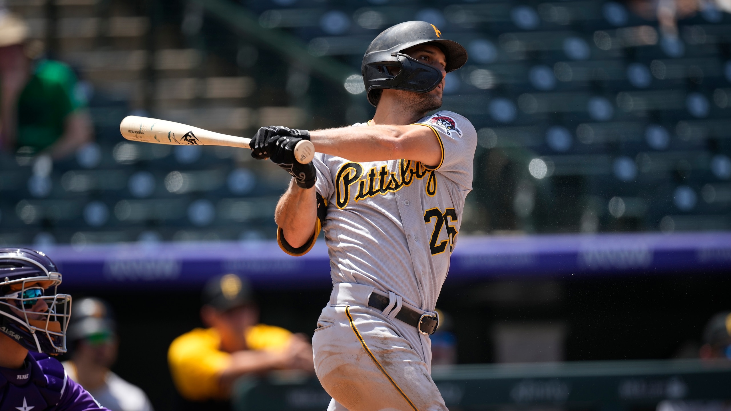 Pittsburgh Pirates second baseman Adam Frazier (26) in the third inning of a baseball game Wednesday, June 30, 2021, in Denver. (AP Photo/David Zalubowski)