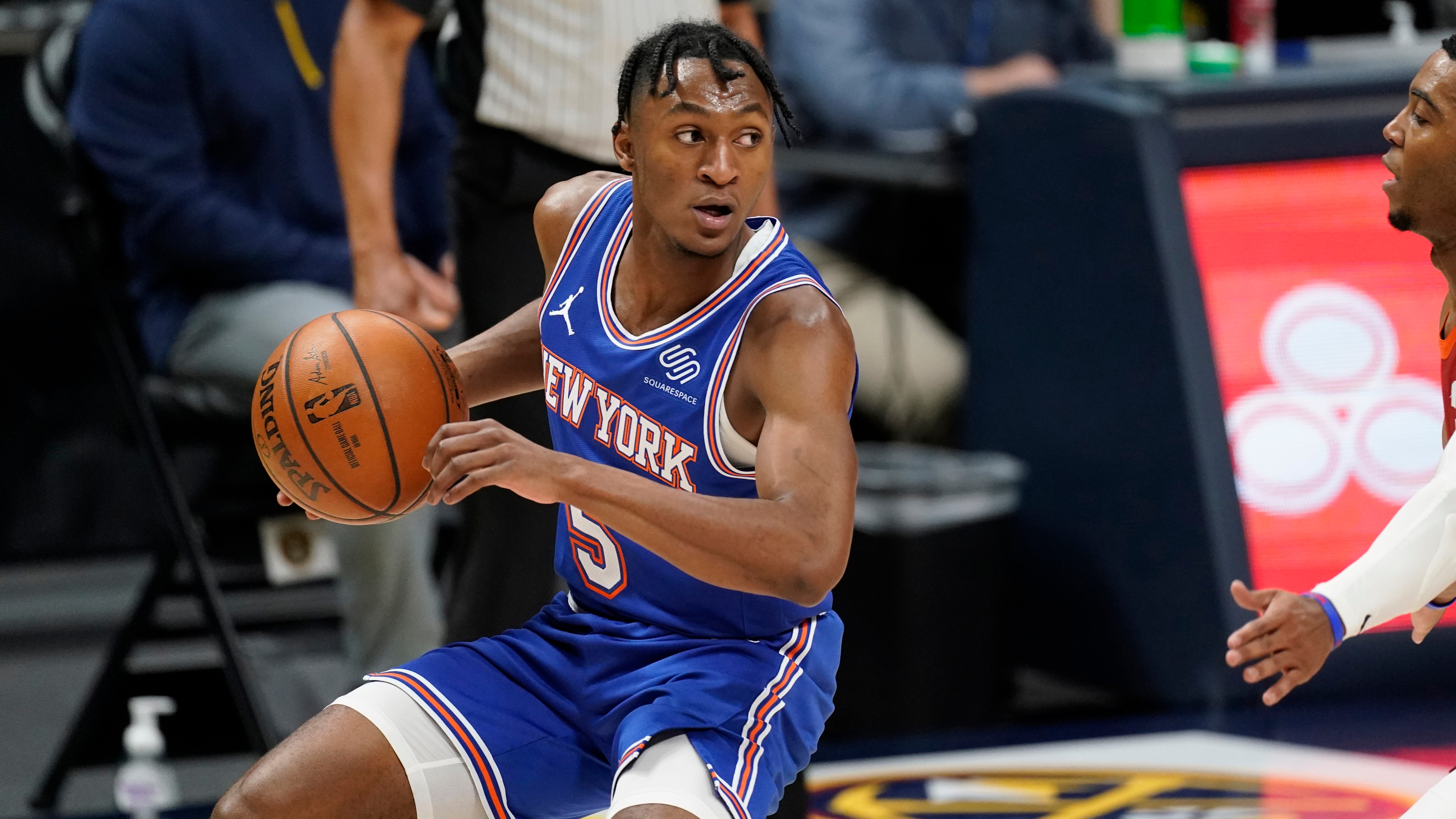 New York Knicks guard Immanuel Quickley (5) in the second half of an NBA basketball game Wednesday, May 5, 2021, in Denver. The Nuggets won 113-97. (AP Photo/David Zalubowski)