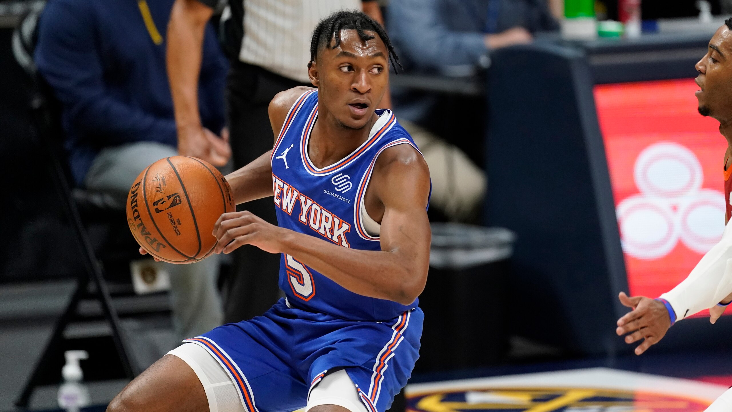 New York Knicks guard Immanuel Quickley (5) in the second half of an NBA basketball game Wednesday, May 5, 2021, in Denver. The Nuggets won 113-97. (AP Photo/David Zalubowski)