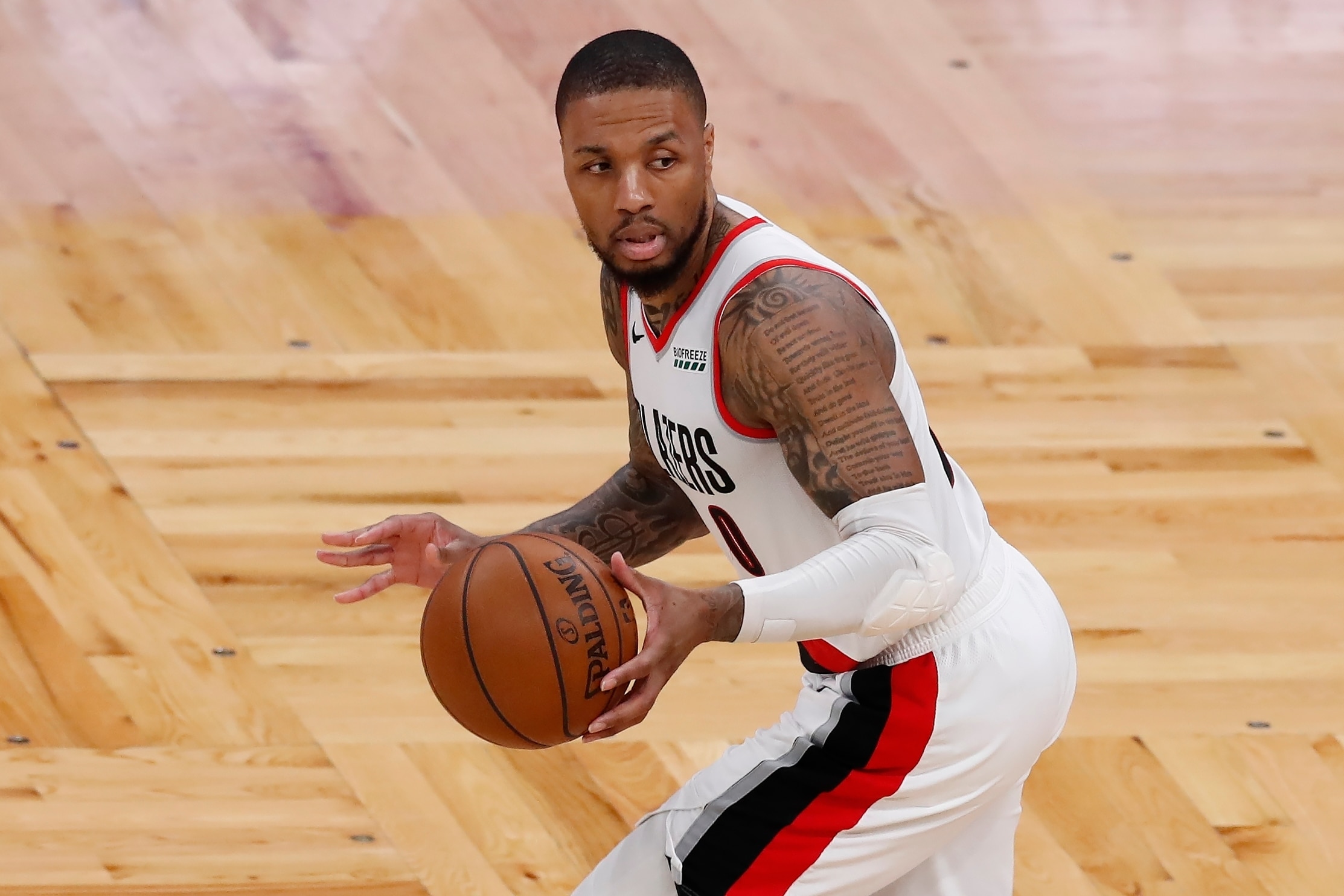 Portland Trail Blazers' Damian Lillard plays against the Boston Celtics during the second half of an NBA basketball game, Sunday, May 2, 2021, in Boston. (AP Photo/Michael Dwyer)