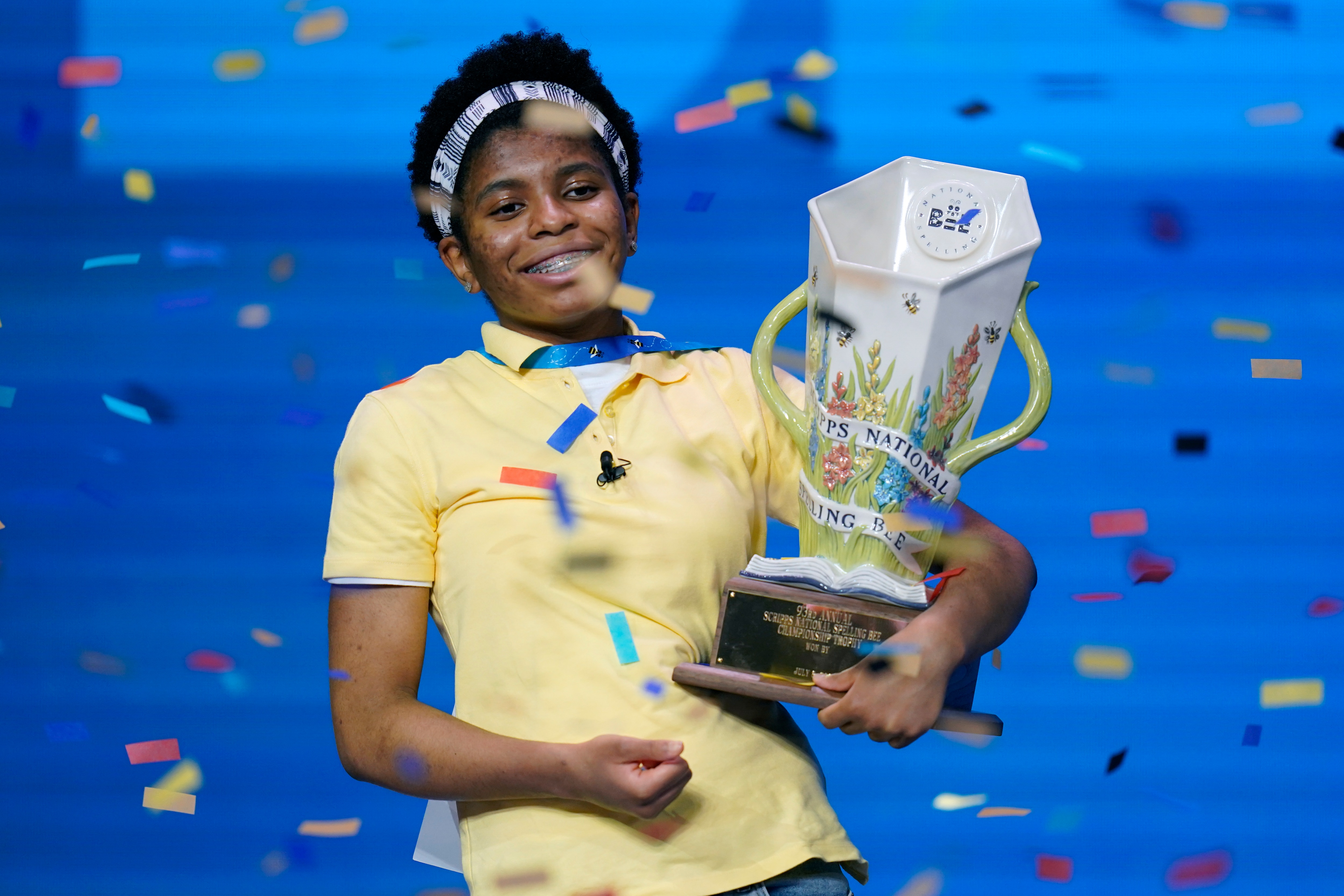 Zaila Avant-garde, 14, from Harvey, Louisiana celebrates with the championship trophy after winning the finals of the 2021 Scripps National Spelling Bee at Disney World Thursday, July 8, 2021, in Lake Buena Vista, Fla. (AP Photo/John Raoux)