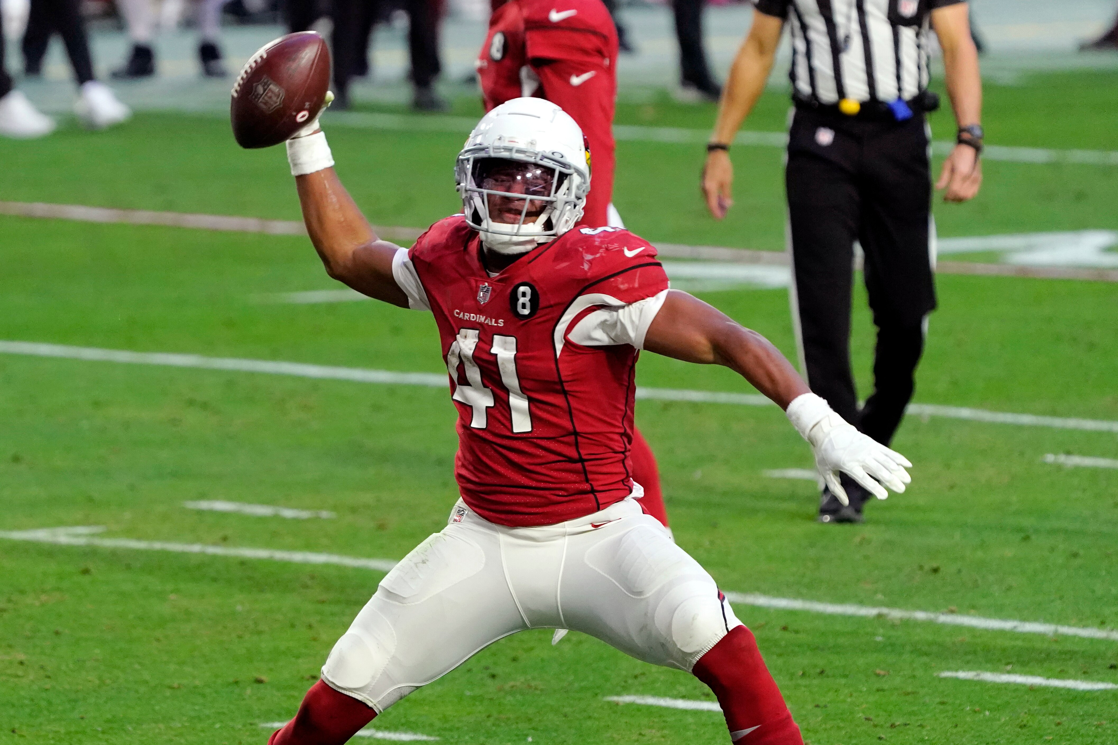 Arizona Cardinals running back Kenyan Drake (41) celebrates his touchdown against the San Francisco 49ers during the second half of an NFL football game, Saturday, Dec. 26, 2020, in Glendale, Ariz. (AP Photo/Rick Scuteri)