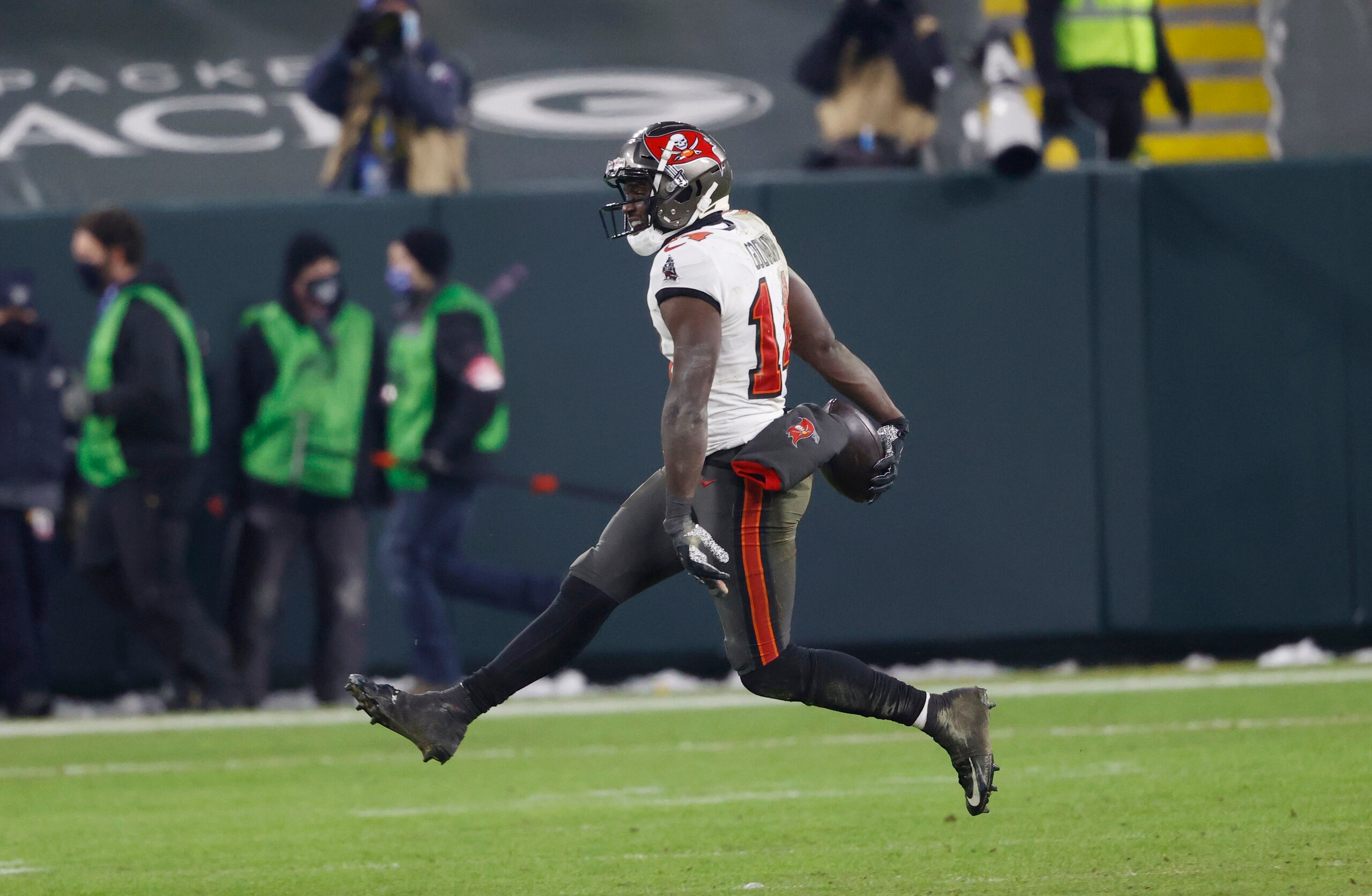 Tampa Bay Buccaneers wide receiver Chris Godwin (14) reacts after an NFC Championship playoff football game between the Tampa Bay Buccaneers and Green Bay Packers, Sunday, Jan. 24, 2021, in Green Bay, Wis. (AP Photo/Jeffrey Phelps)