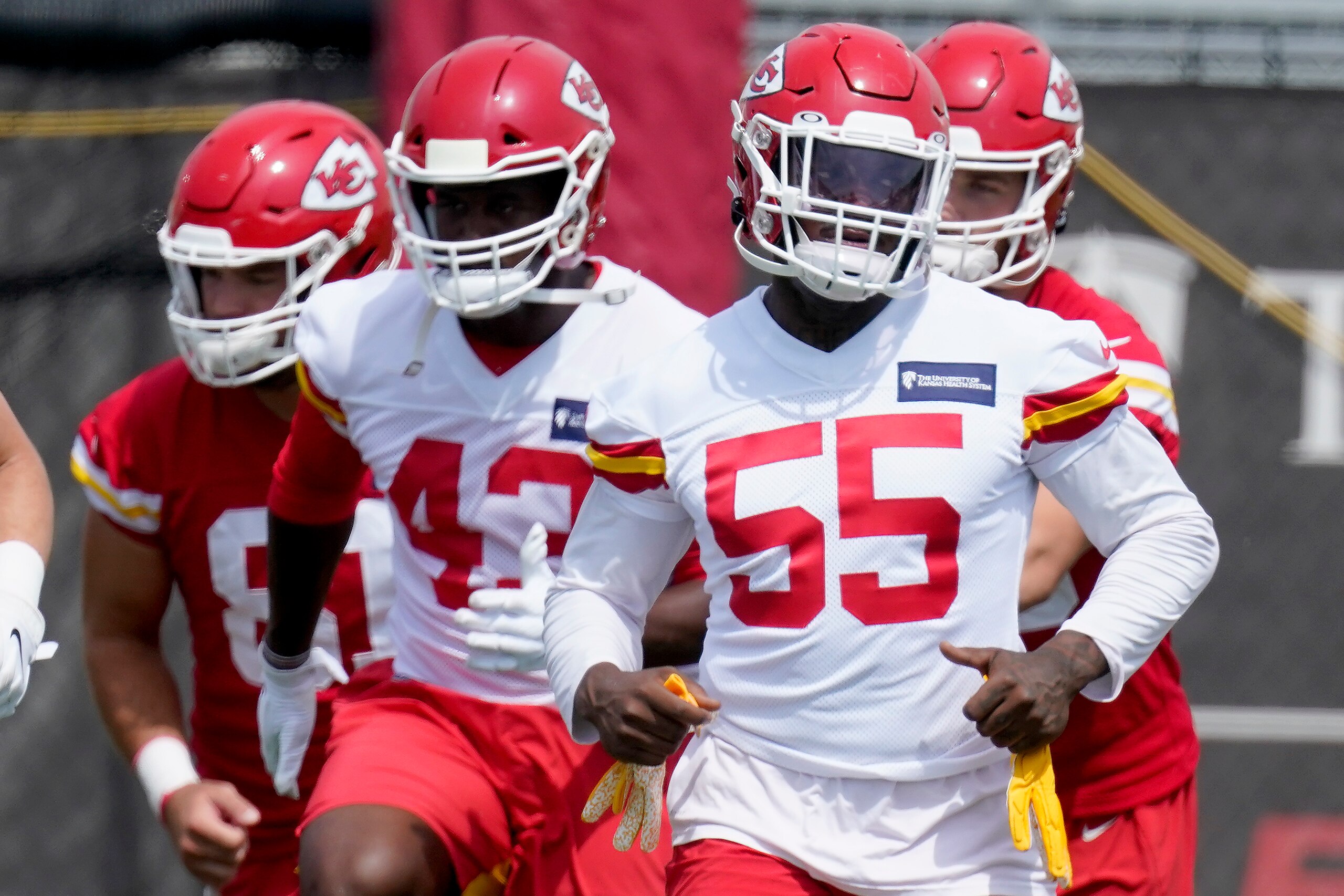 Kansas City Chiefs defensive end Frank Clark (55) runs during the NFL football team's minicamp Wednesday, June 16, 2021, in Kansas City, Mo. (AP Photo/Charlie Riedel)