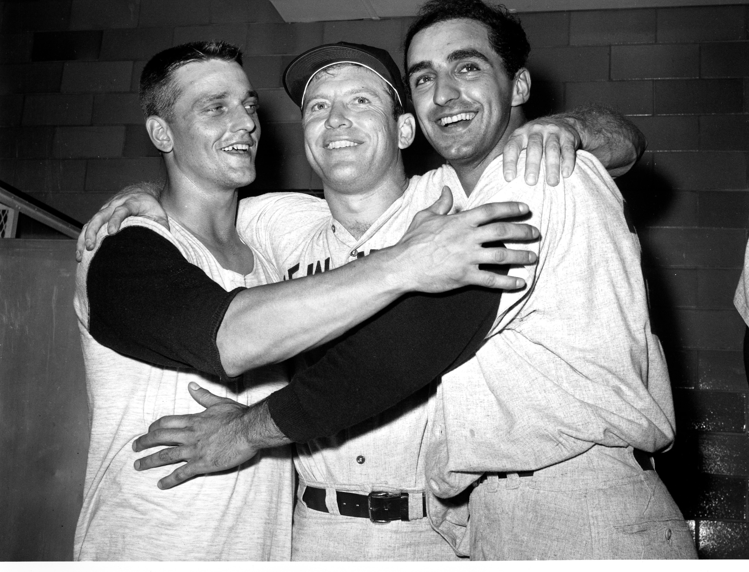 Roger Maris, Mickey Mantle, and Joe Pepitone pose for a photo after their 8-3 win over the St. Louis Cardinals on Oct. 14, 1964 in the sixth game of the World Series in St. Louis.  (AP Photo)