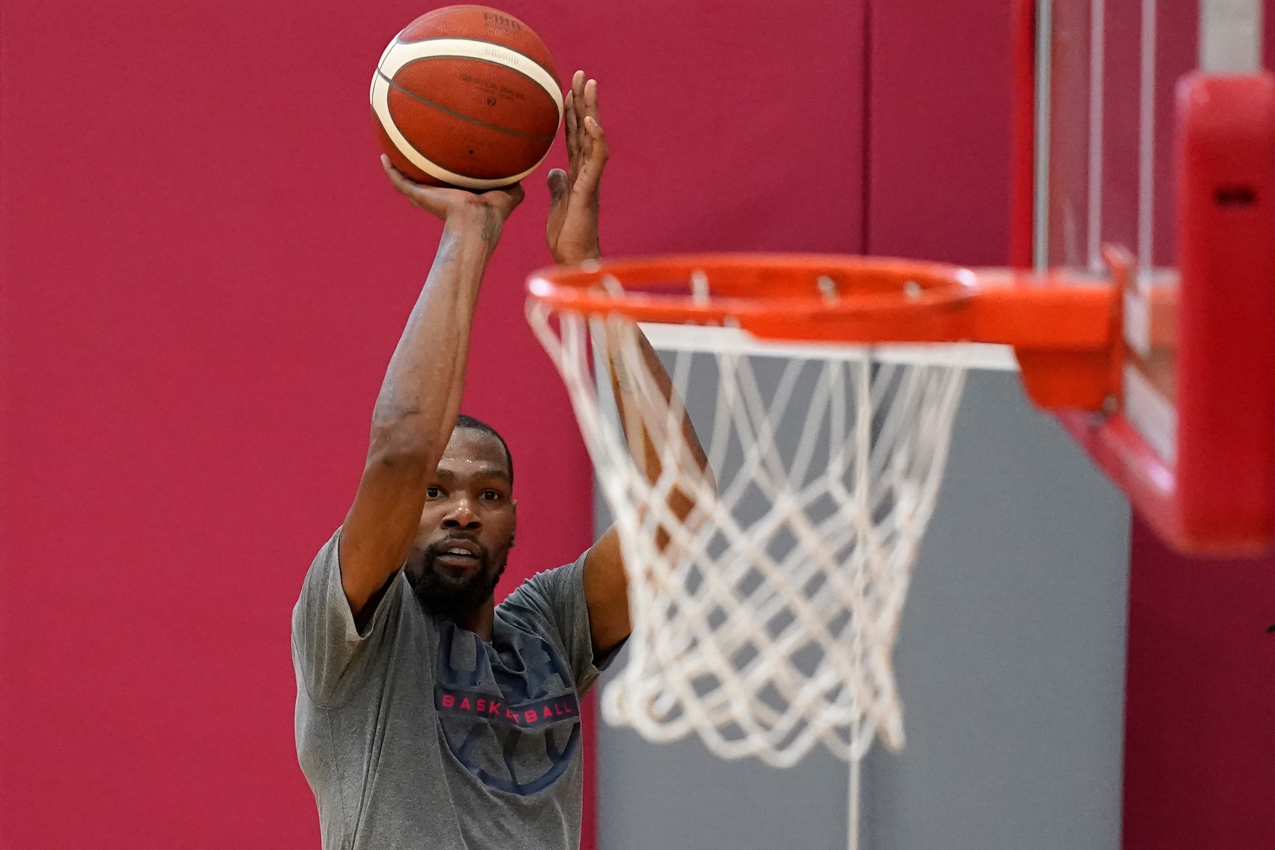 Kevin Durant shoots during practice for USA Basketball, Wednesday, July 7, 2021, in Las Vegas. (AP Photo/John Locher)