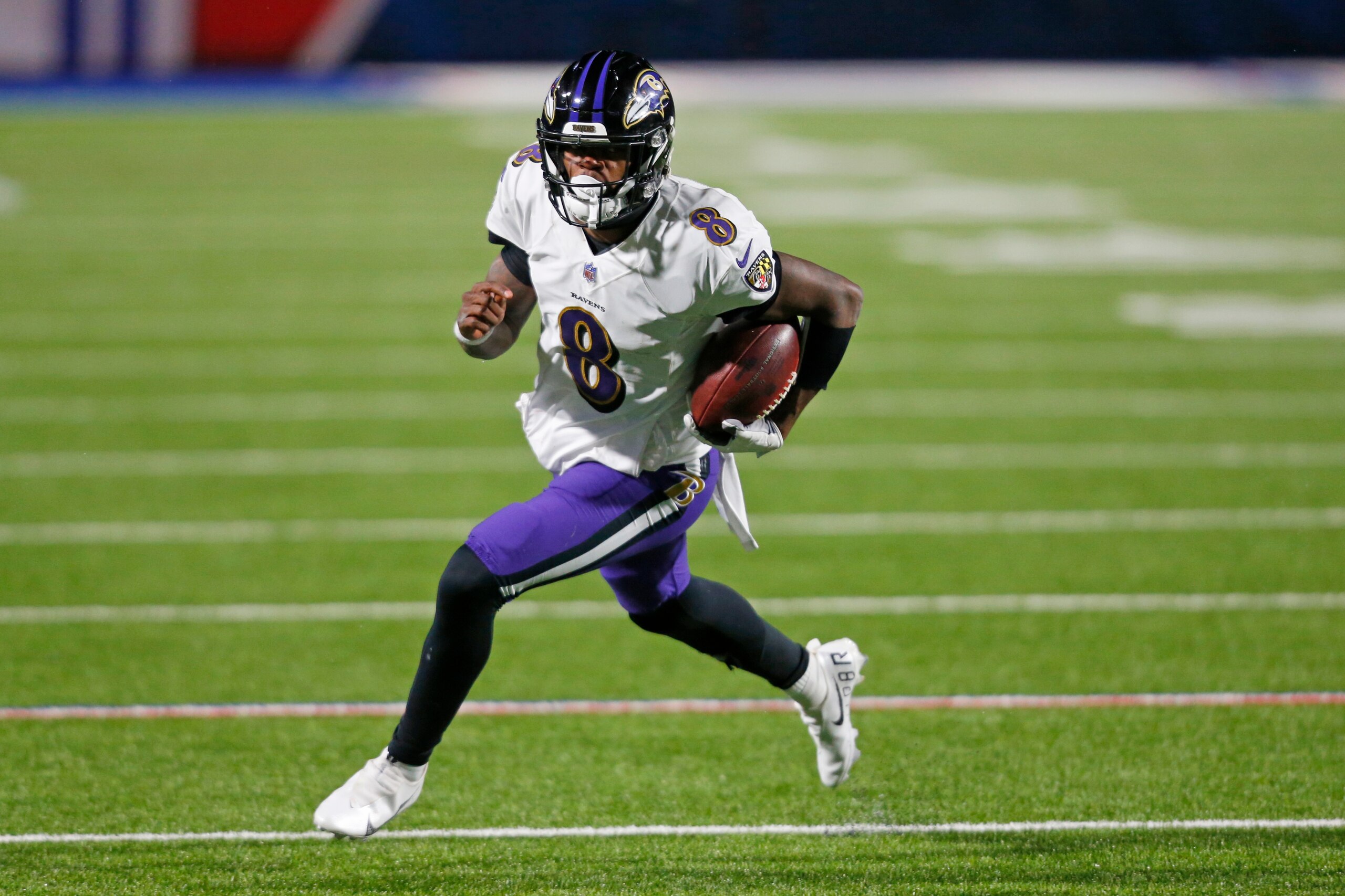 Baltimore Ravens quarterback Lamar Jackson (8) rushes during the second half of an NFL divisional round football game against the Buffalo Bills Saturday, Jan. 16, 2021, in Orchard Park, N.Y. (AP Photo/Jeffrey T. Barnes)