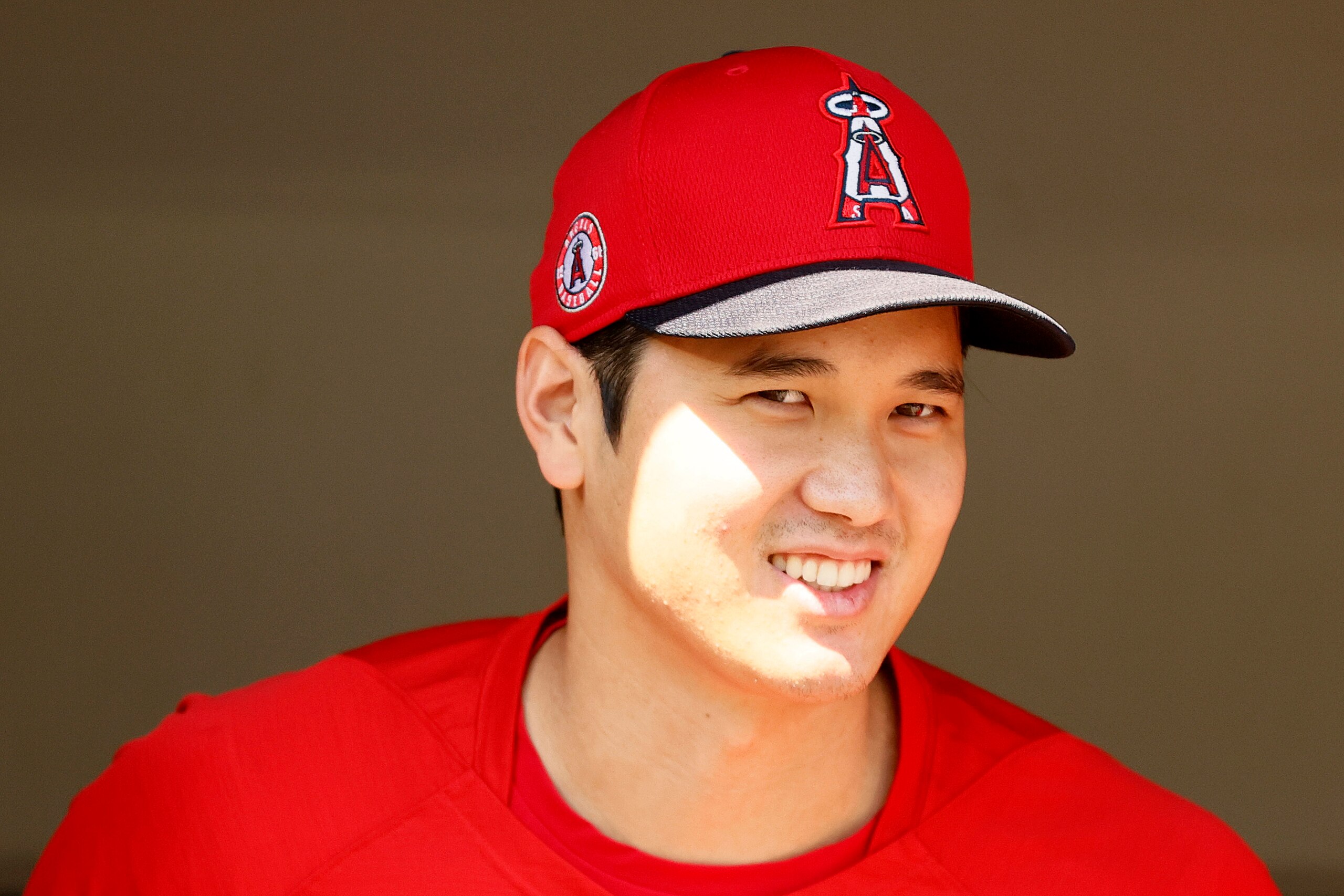 SEATTLE, WASHINGTON - JULY 11: Shohei Ohtani #17 of the Los Angeles Angels looks on from the dugout before the game against the Seattle Mariners at T-Mobile Park on July 11, 2021 in Seattle, Washington. (Photo by Steph Chambers/Getty Images)