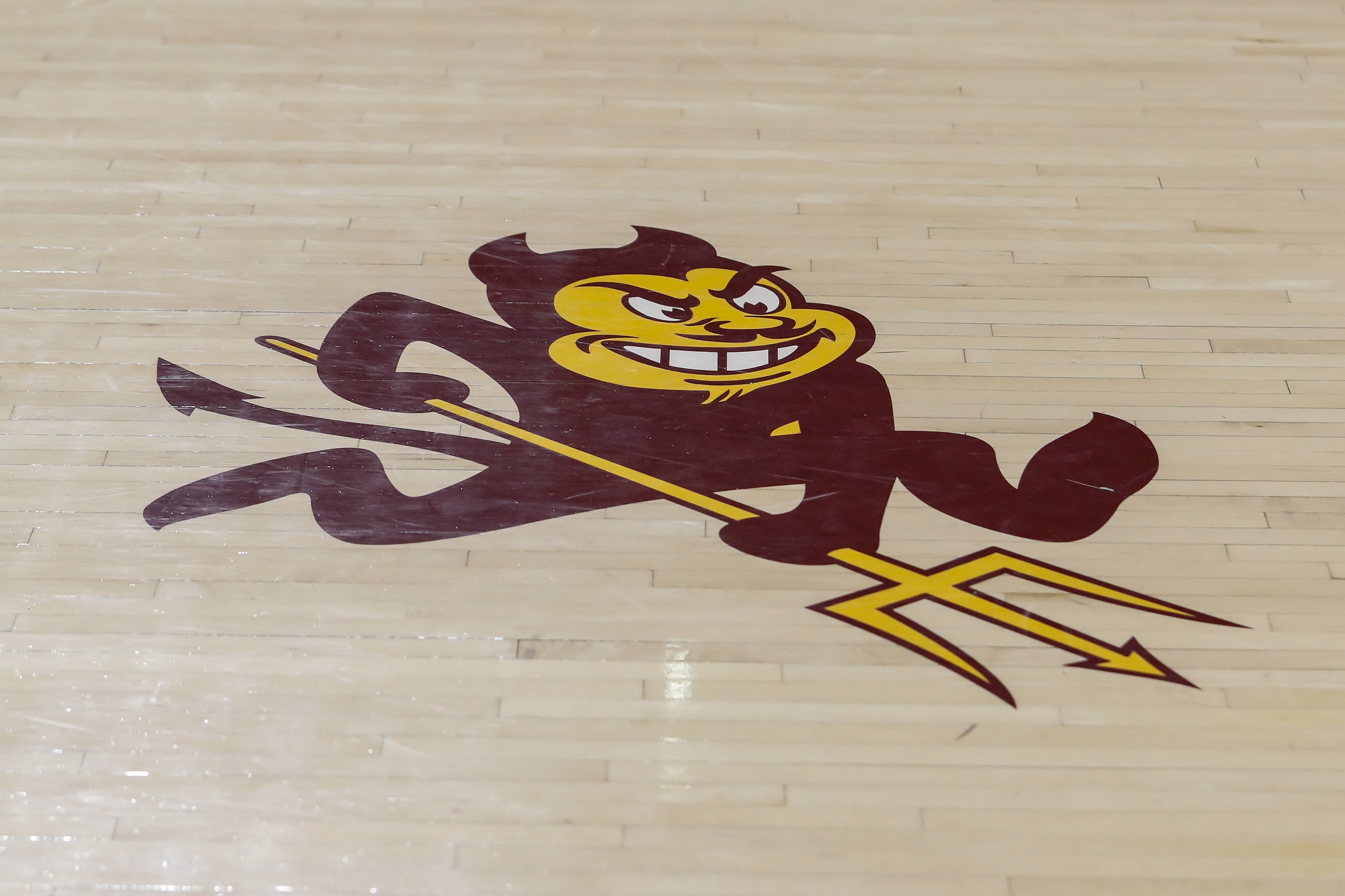 TEMPE, AZ - FEBRUARY 08: The Arizona State Sun Devils logo sparky on the court before the college basketball game between the USC Trojans and the Arizona State Sun Devils on February 8, 2020 at Desert Financial Arena in Tempe, Arizona. (Photo by Kevin Abele/Icon Sportswire via Getty Images) TEMPE, AZ - FEBRUARY 08: The Arizona State Sun Devils logo sparky on the court before the college basketball game between the USC Trojans and the Arizona State Sun Devils on February 8, 2020 at Desert Financial Arena in Tempe, Arizona. (Photo by Kevin Abele/Icon Sportswire via Getty Images)