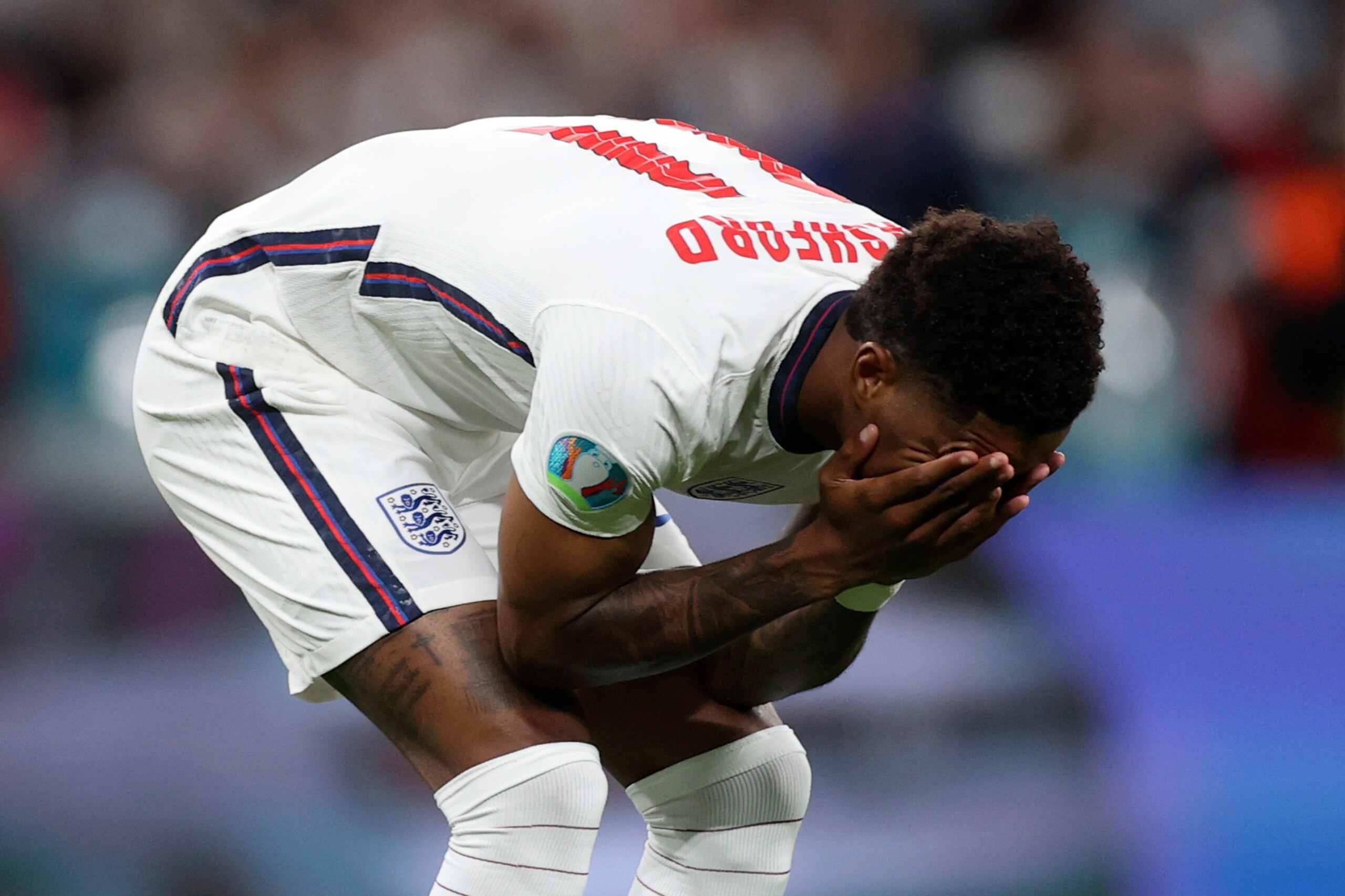 England's Marcus Rashford reacts after failing to score a penalty during a shootout at the end of the Euro 2020 soccer championship final match between England and Italy at Wembley stadium in London, Sunday, July 11, 2021. Italy defeated England 3-2 in a penalty shootout after the game ended in a 1-1 draw. (Carl Recine/Pool Photo via AP) England's Marcus Rashford reacts after failing to score a penalty during a shootout at the end of the Euro 2020 soccer championship final match between England and Italy at Wembley stadium in London, Sunday, July 11, 2021. Italy defeated England 3-2 in a penalty shootout after the game ended in a 1-1 draw. (Carl Recine/Pool Photo via AP)