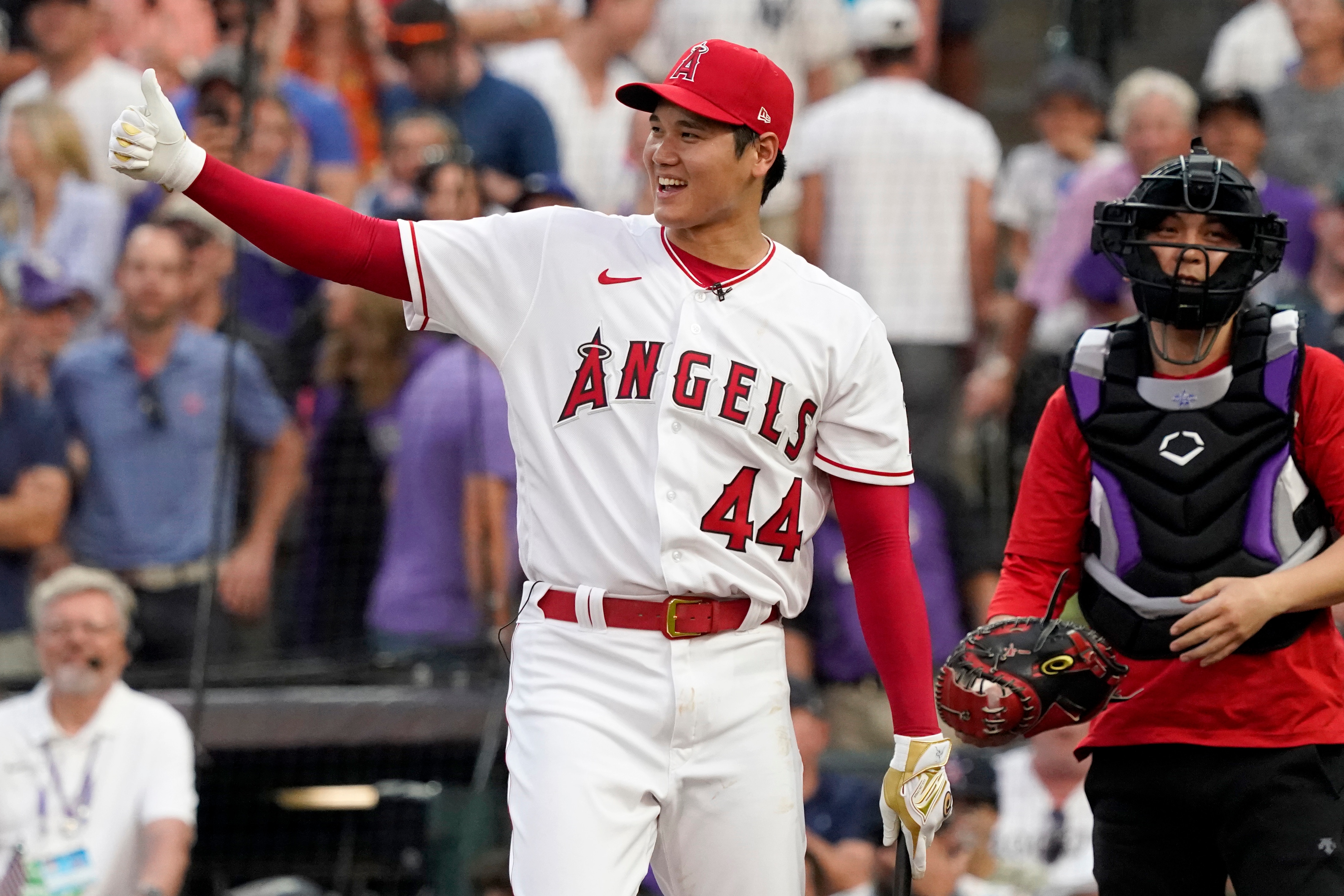 American League's Shohei Ohtani, of the Los Angeles Angeles, gives the thumbs up after the first round of the MLB All Star baseball Home Run Derby, Monday, July 12, 2021, in Denver. (AP Photo/Gabriel Christus)
