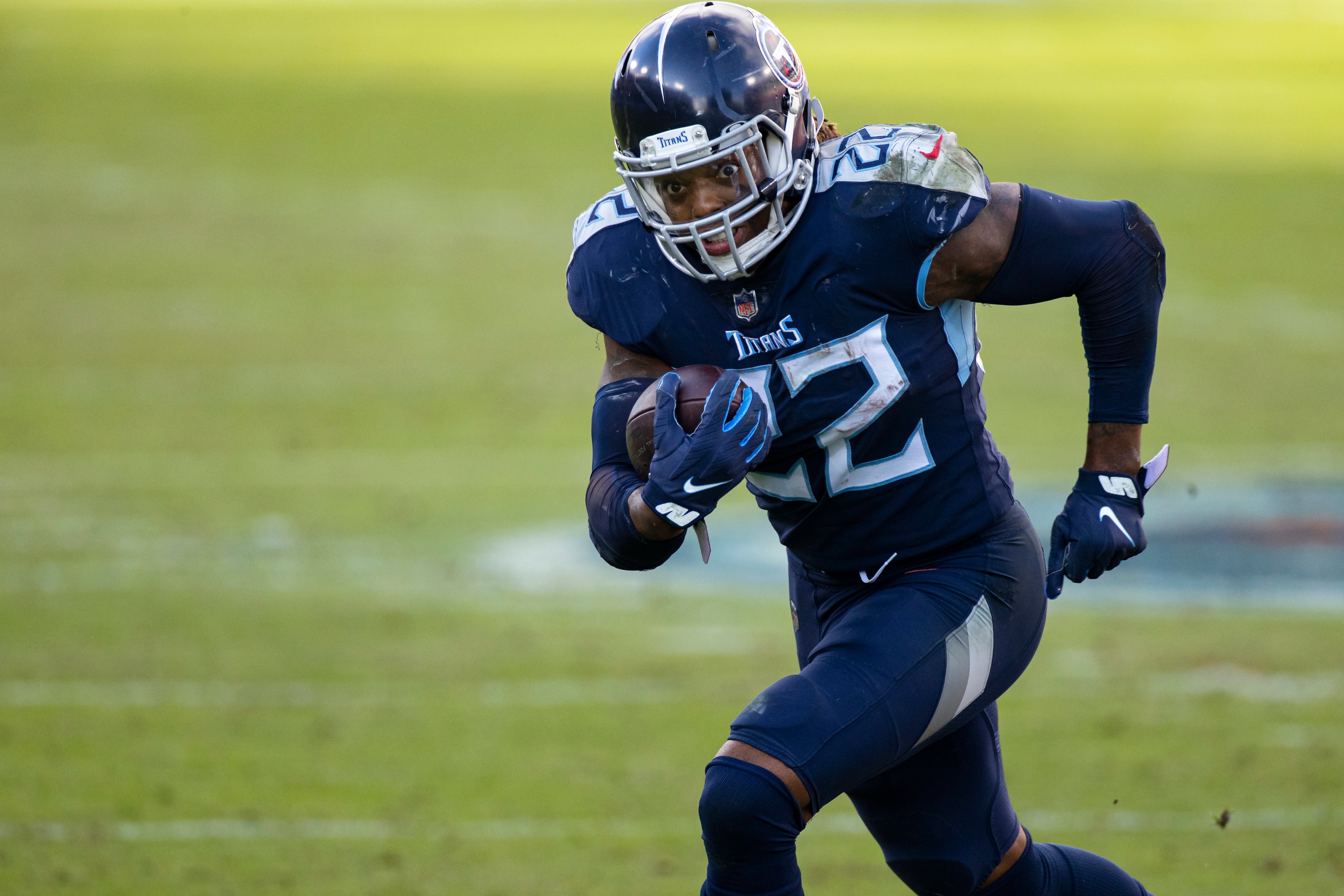 FILE - In this Dec. 20, 2020, file photo, Tennessee Titans running back Derrick Henry (22) carries ball against the Detroit Lions during the fourth quarter of an NFL football game in Nashville, Tenn. Henry as named The Associated Press Offensive Player of the Year on Saturday, Feb. 6, at the NFL Honors. (AP Photo/Brett Carlsen, File) FILE - In this Dec. 20, 2020, file photo, Tennessee Titans running back Derrick Henry (22) carries ball against the Detroit Lions during the fourth quarter of an NFL football game in Nashville, Tenn. Henry as named The Associated Press Offensive Player of the Year on Saturday, Feb. 6, at the NFL Honors. (AP Photo/Brett Carlsen, File)