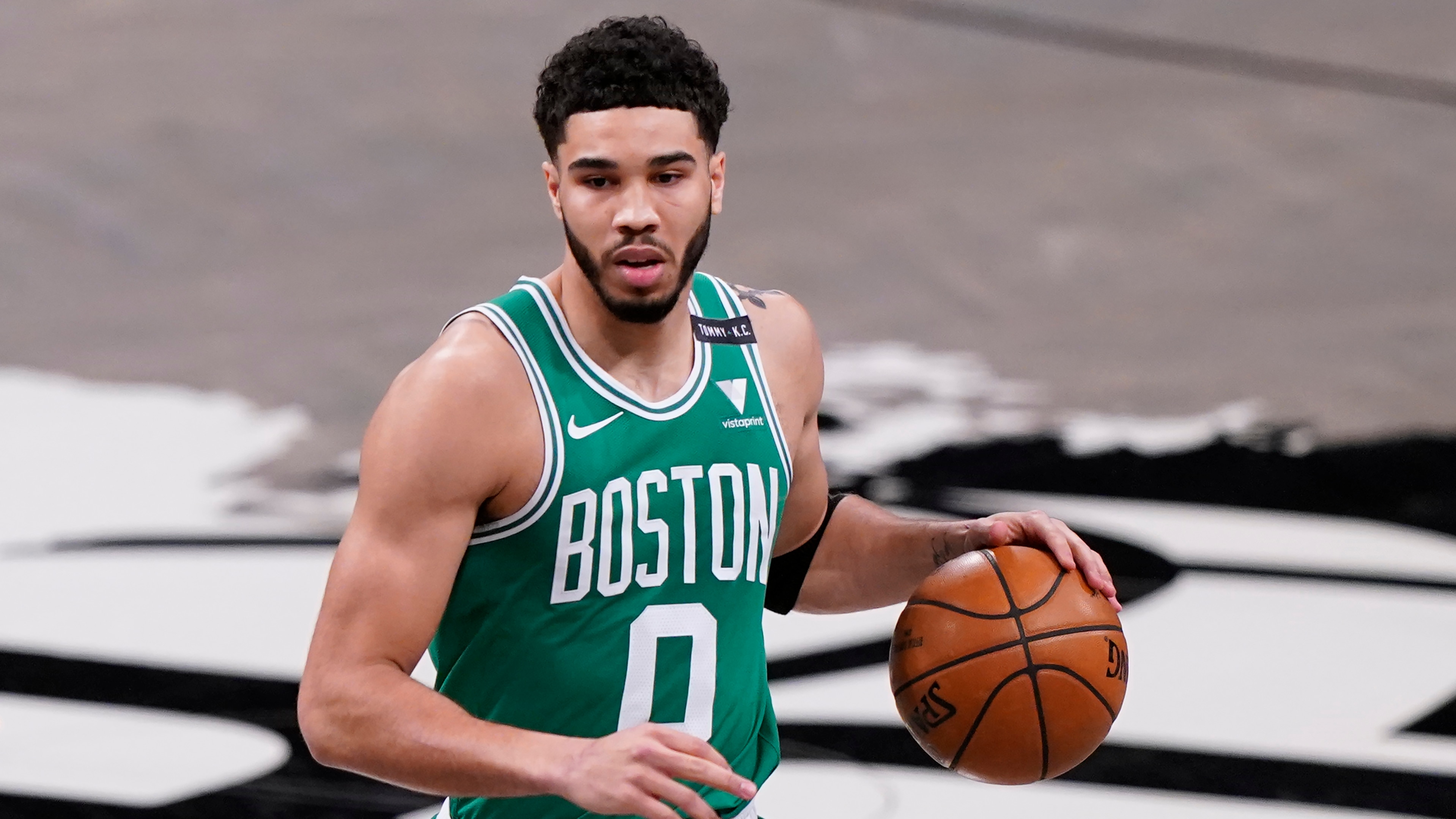 Boston Celtics forward Jayson Tatum (0) holds the ball during the first quarter of Game 2 of an NBA basketball first-round playoff series against the Brooklyn Nets, Tuesday, May 25, 2021, in New York. (AP Photo/Kathy Willens)