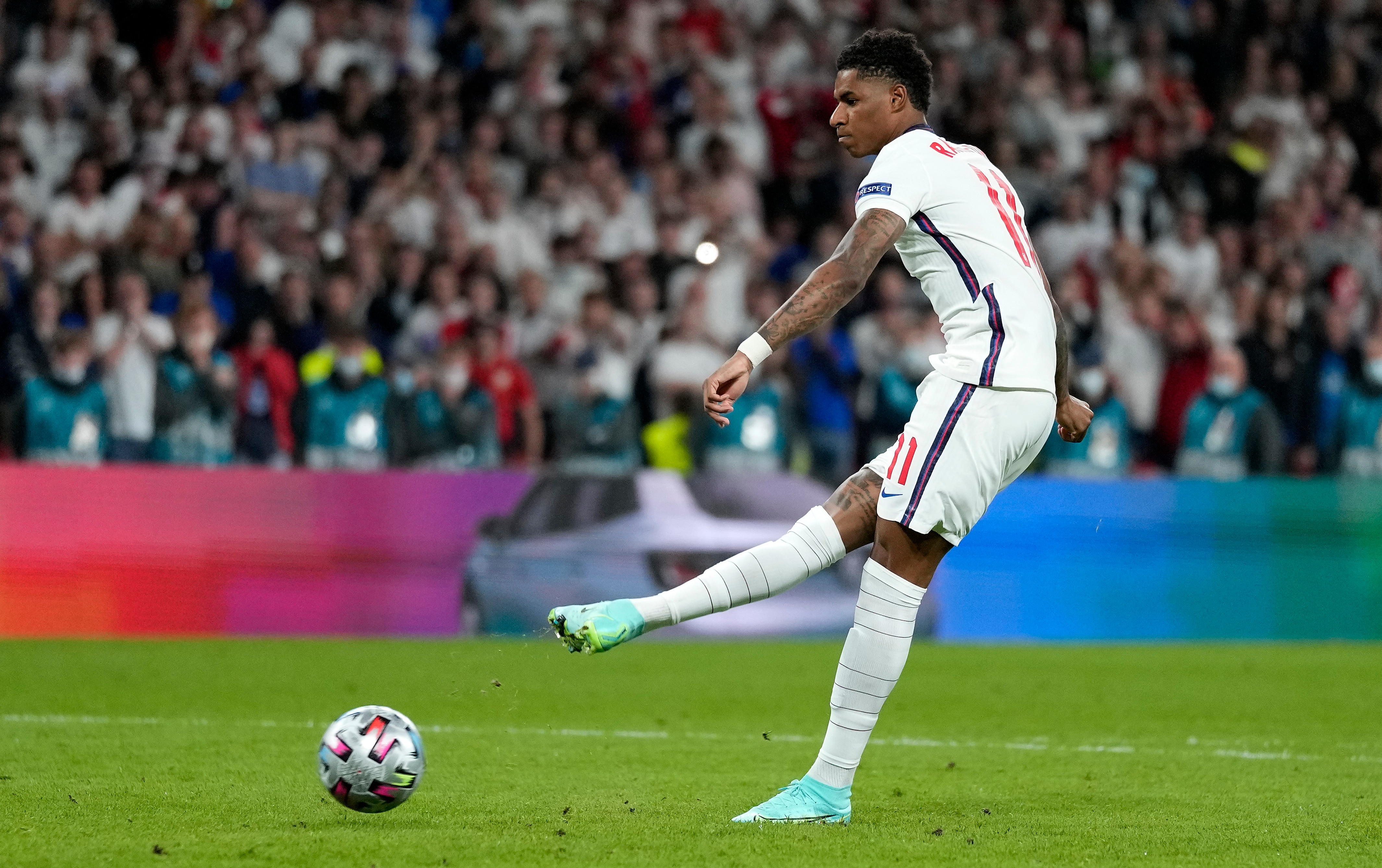 England's Marcus Rashford misses to score during the penalty shootout of the Euro 2020 soccer championship final between England and Italy at Wembley stadium in London, Sunday, July 11, 2021. (AP Photo/Frank Augstein, Pool)