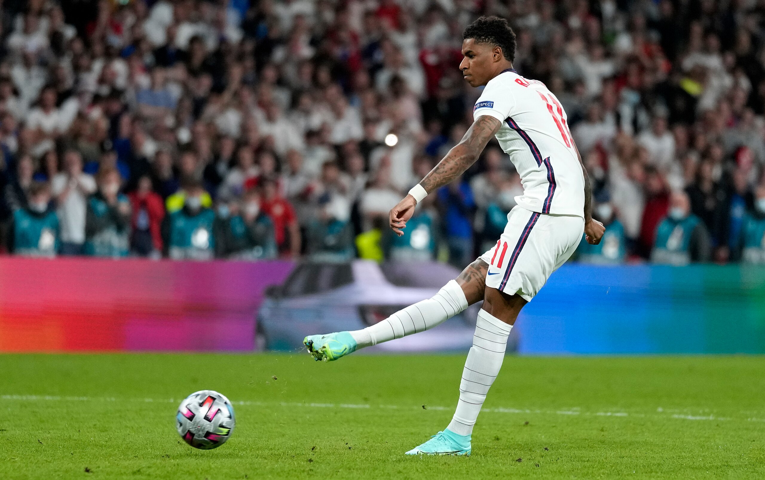 England's Marcus Rashford misses to score during the penalty shootout of the Euro 2020 soccer championship final between England and Italy at Wembley stadium in London, Sunday, July 11, 2021. (AP Photo/Frank Augstein, Pool)