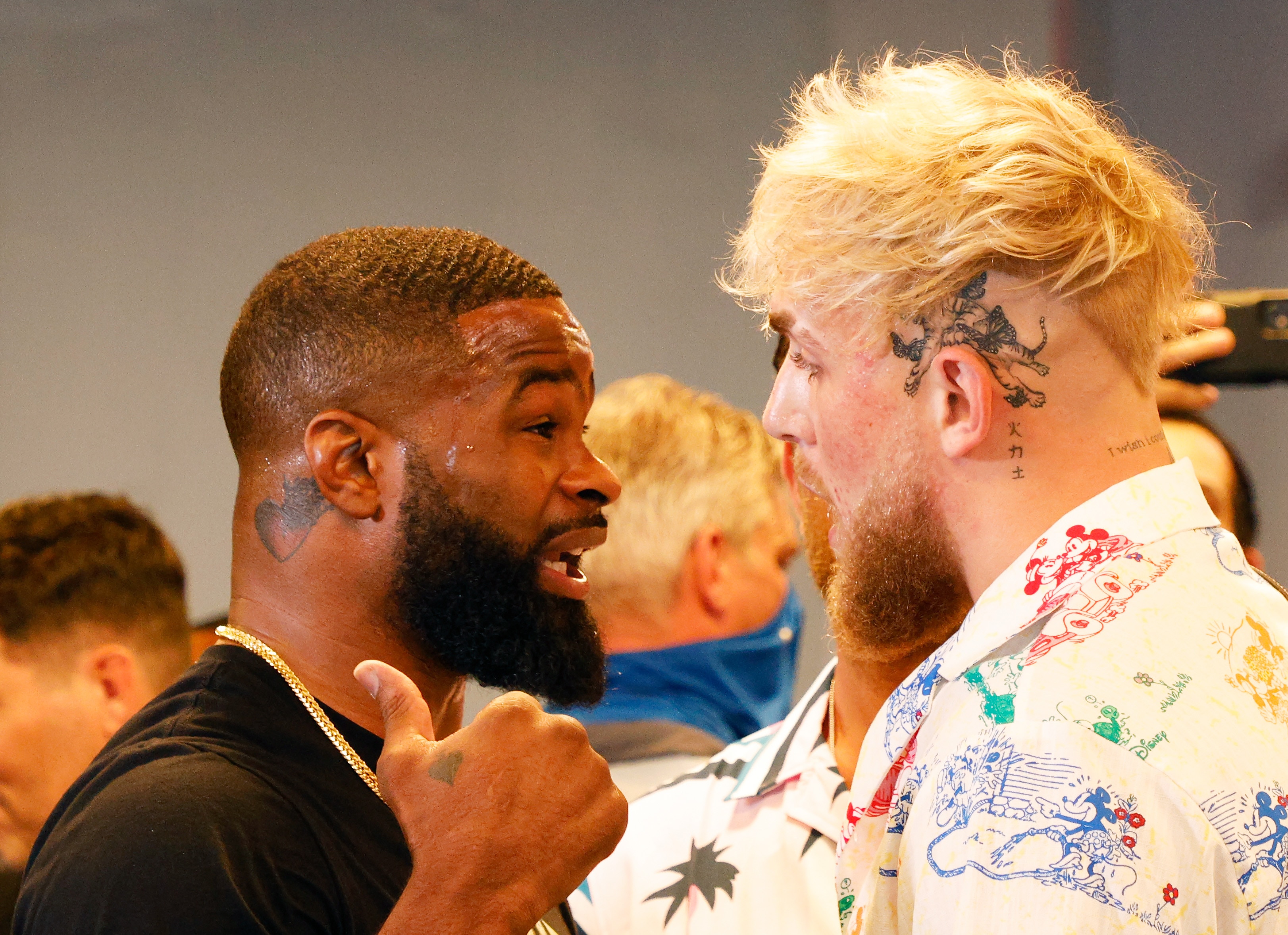 MIAMI, FLORIDA - JUNE 03: Jake Paul and Tyron Woodley take part in media availability at 5th St. Gym ahead of their August 28th boxing match on June 03, 2021 in Miami, Florida. (Photo by Cliff Hawkins/Getty Images)