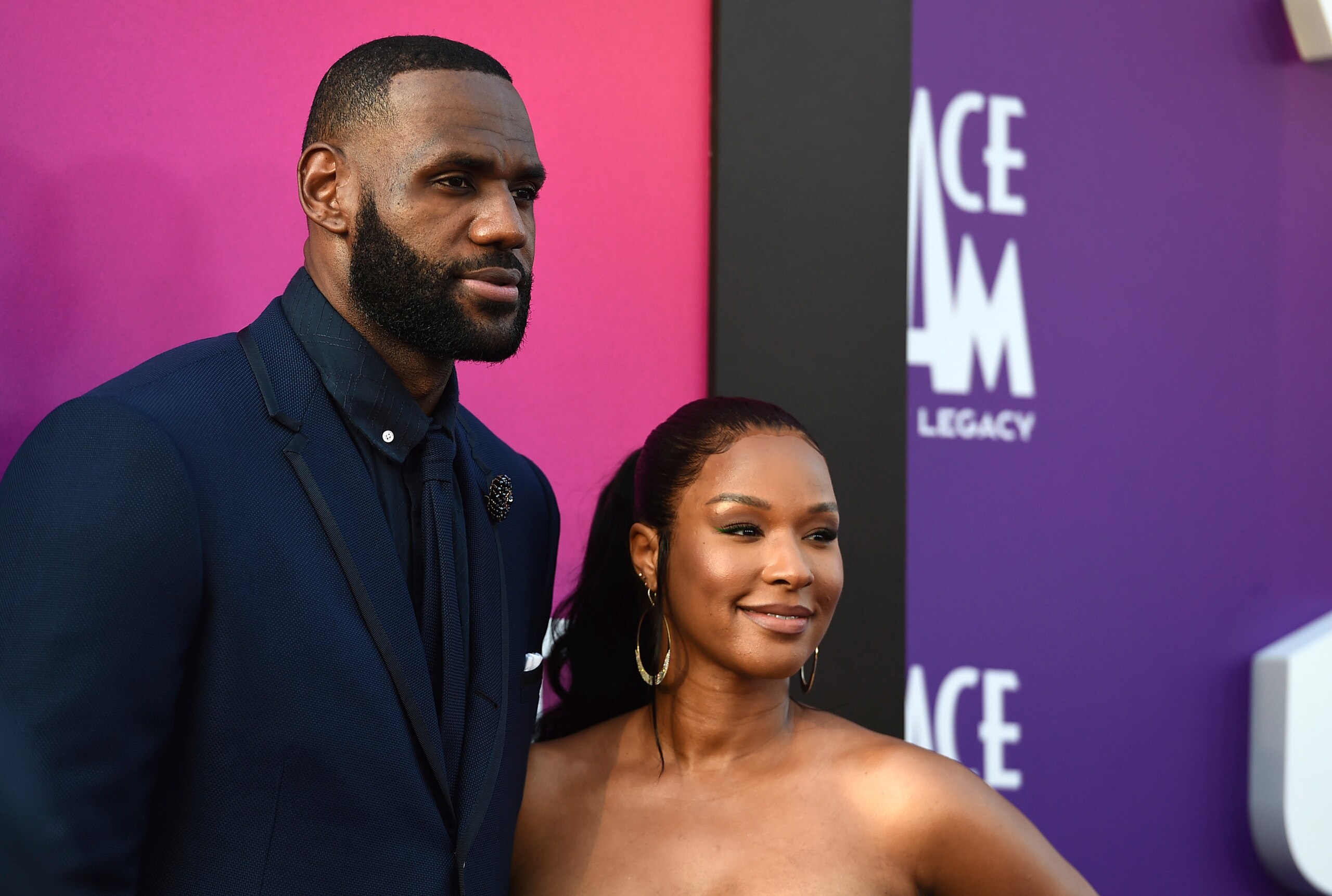 NBA basketball player LeBron James, left, of the Los Angeles Lakers, and Savannah Brinson arrive at the world premiere of "Space Jam: A New Legacy" on Monday, July 12, 2021, at Regal L.A. Live in Los Angeles. (Photo by Jordan Strauss/Invision/AP)