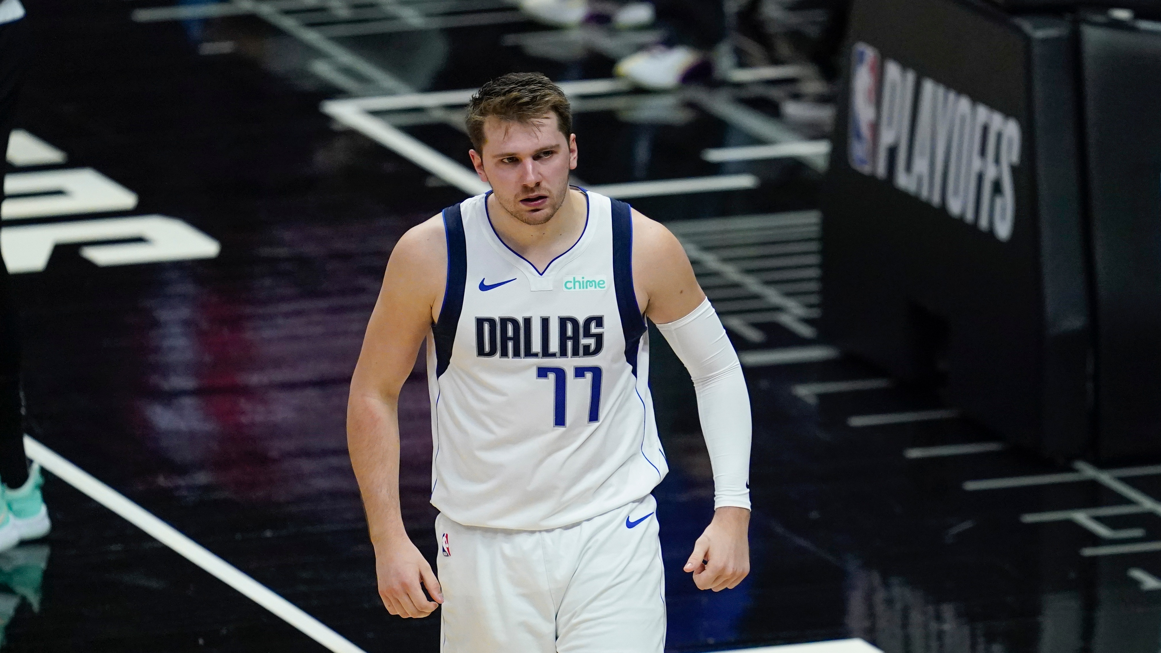 Dallas Mavericks guard Luka Doncic (77) reacts after scoring during Game 7 of an NBA basketball first-round playoff series against the Los Angeles Clippers Sunday, June 6, 2021, in Los Angeles, Calif. (AP Photo/Ashley Landis)