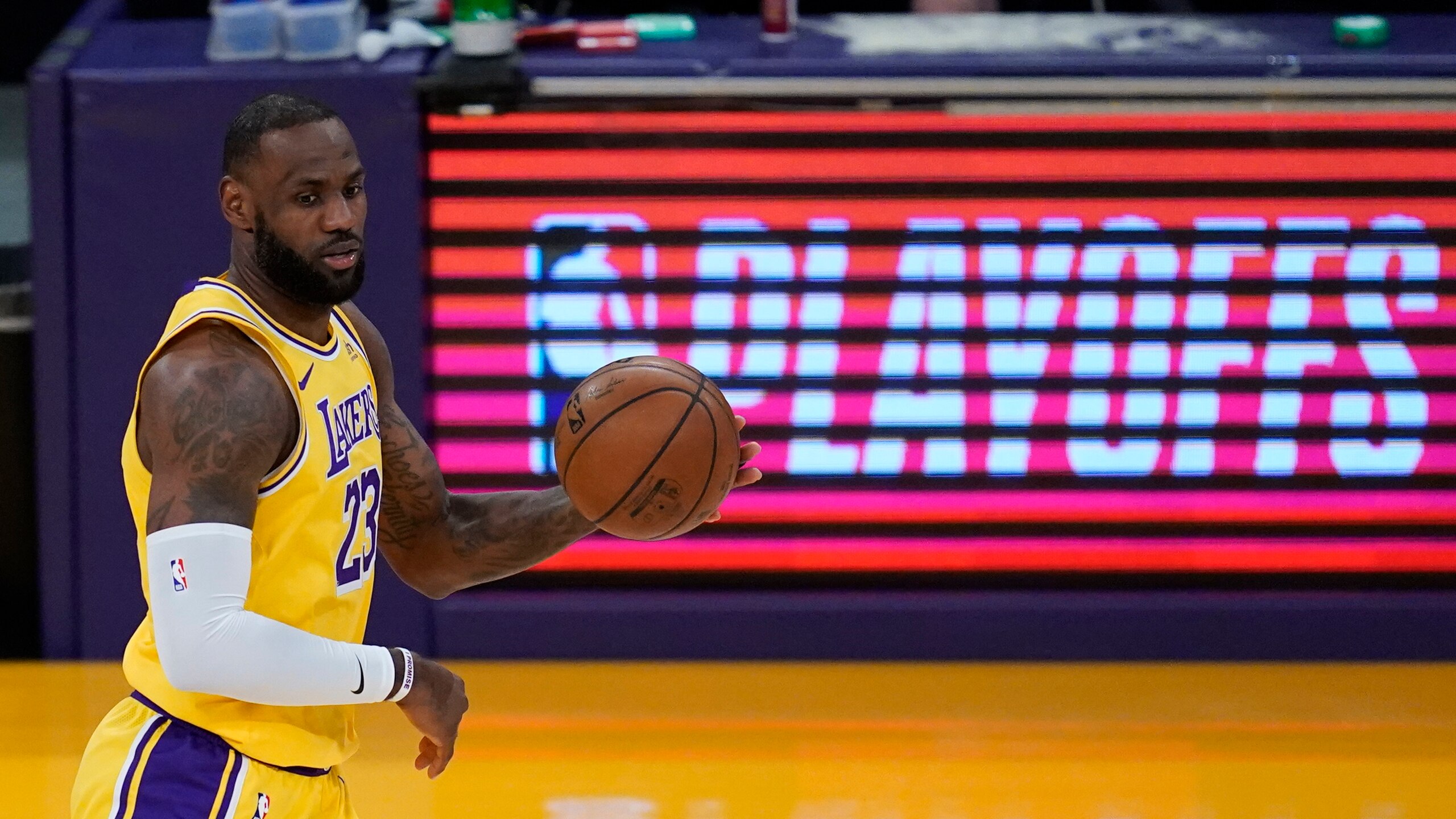 Los Angeles Lakers forward LeBron James (23) controls the ball during Game 6 of an NBA basketball first-round playoff series against the Phoenix Suns Thursday, Jun 3, 2021, in Los Angeles. (AP Photo/Ashley Landis)