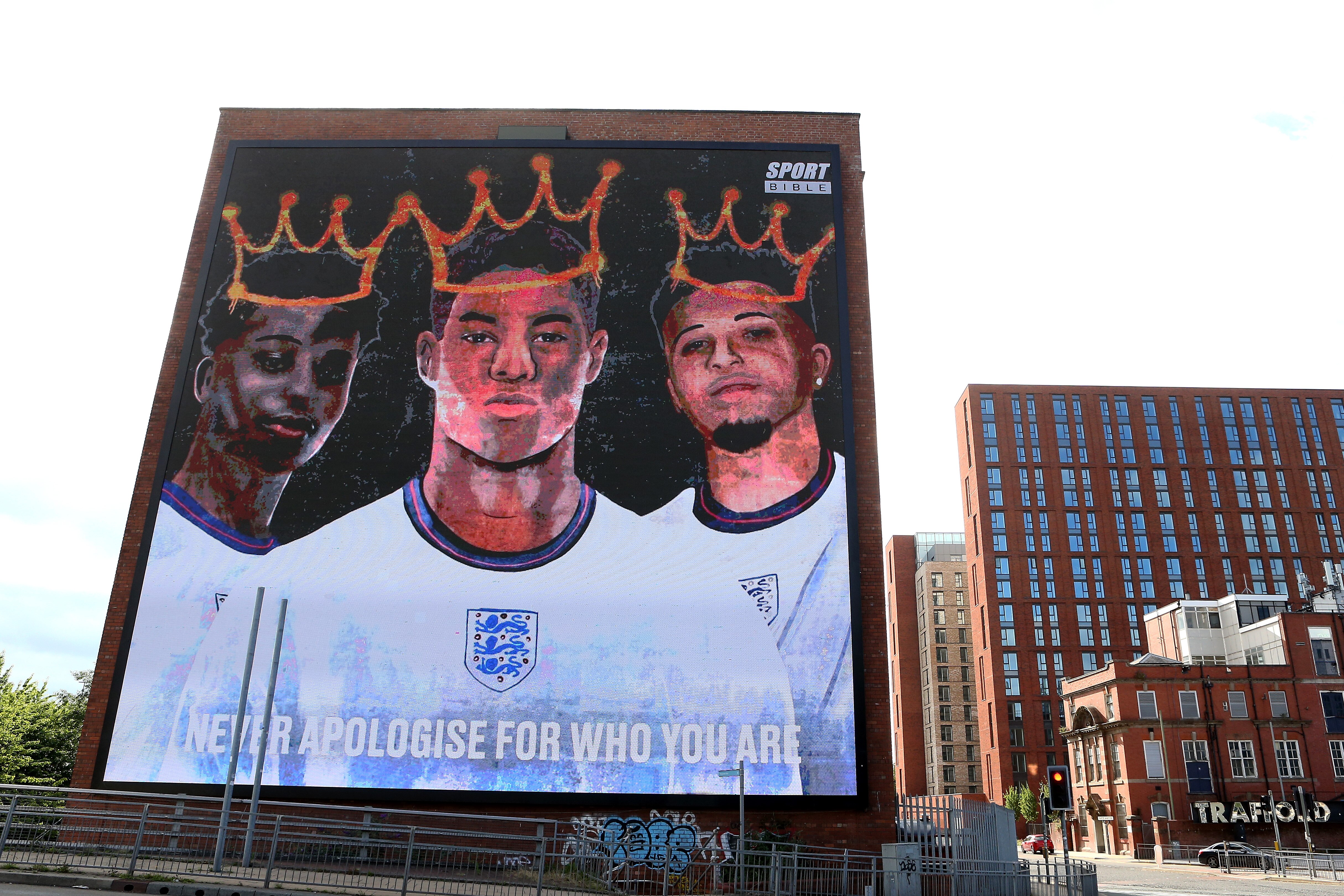 MANCHESTER, ENGLAND - JULY 14: A general view of the mural at Trafford Park is seen on July 14, 2021 in Manchester, England. A Giant mural in support of the three England footballers Marcus Rashford, Jadon Sancho and Bukayo Saka has been unveiled in Manchester. The England stars were targeted with racist abuse online after they missed penalties in the Euro 2020 final leading to defeat by Italy. (Photo by Charlotte Tattersall/Getty Images)