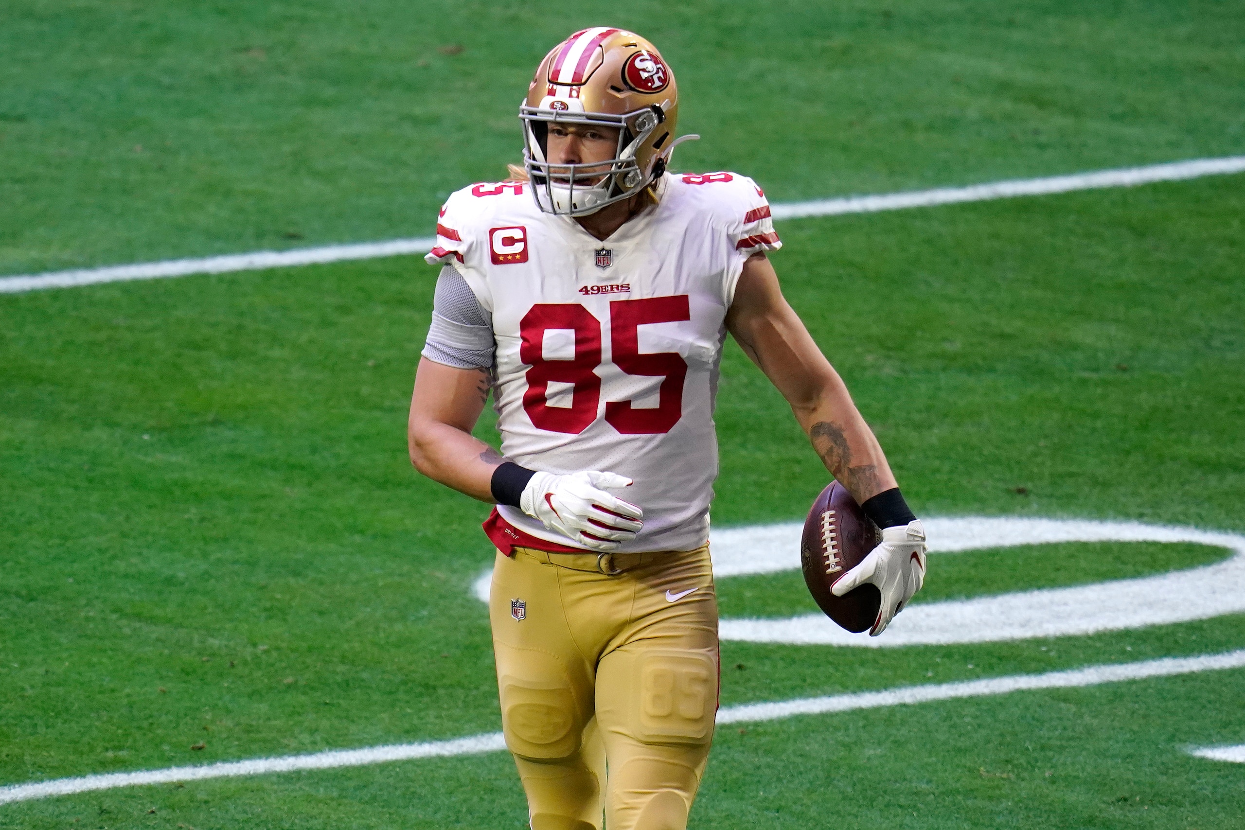 San Francisco 49ers tight end George Kittle (85) warms up prior to an NFL football game against the Seattle Seahawks, Sunday, Jan. 3, 2021, in Glendale, Ariz. (AP Photo/Ross D. Franklin)