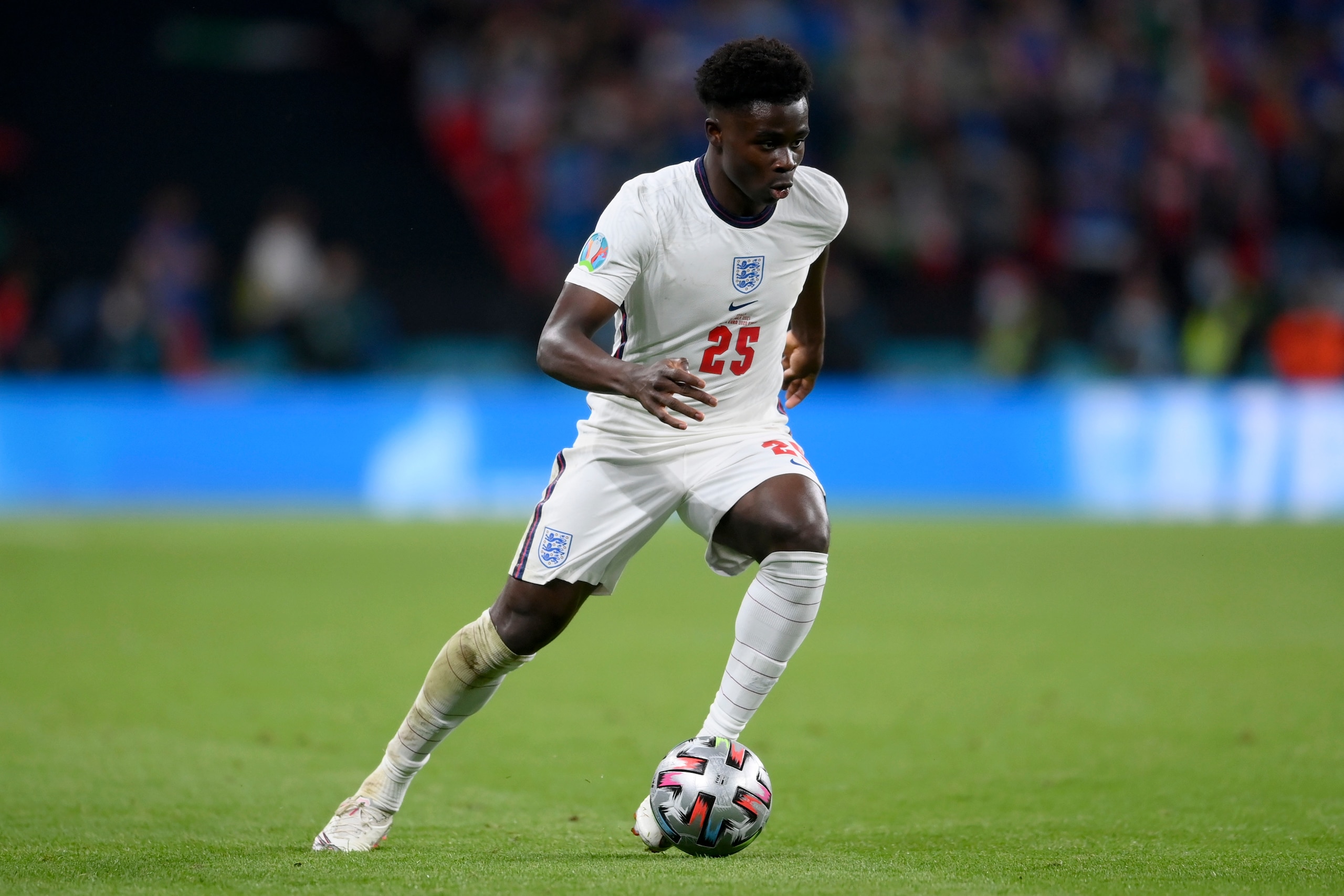 England's Bukayo Saka controls the ball during the Euro 2020 soccer final match between England and Italy at Wembley stadium in London, Sunday, July 11, 2021. (Laurence Griffiths/Pool via AP)