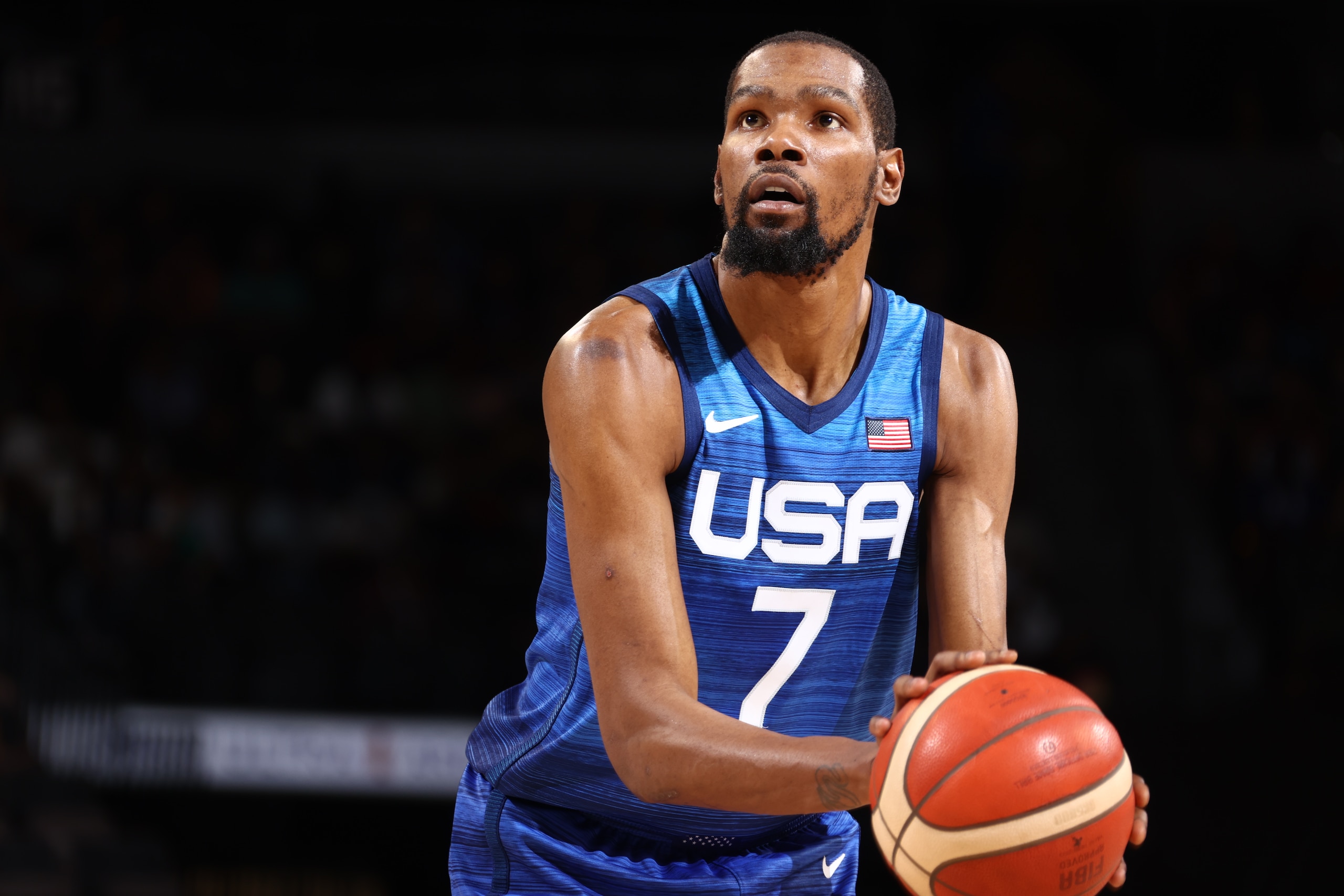 LAS VEGAS, NV - JULY 13: Kevin Durant #7 of the USA Men's National Team shoots a free throw during the game against the Argentina Men's National Team on July 13, 2021 at Michelob ULTRA Arena in Las Vegas, Nevada. NOTE TO USER: User expressly acknowledges and agrees that, by downloading and or using this photograph, User is consenting to the terms and conditions of the Getty Images License Agreement. (Photo by Ned Dishman/NBAE via Getty Images)