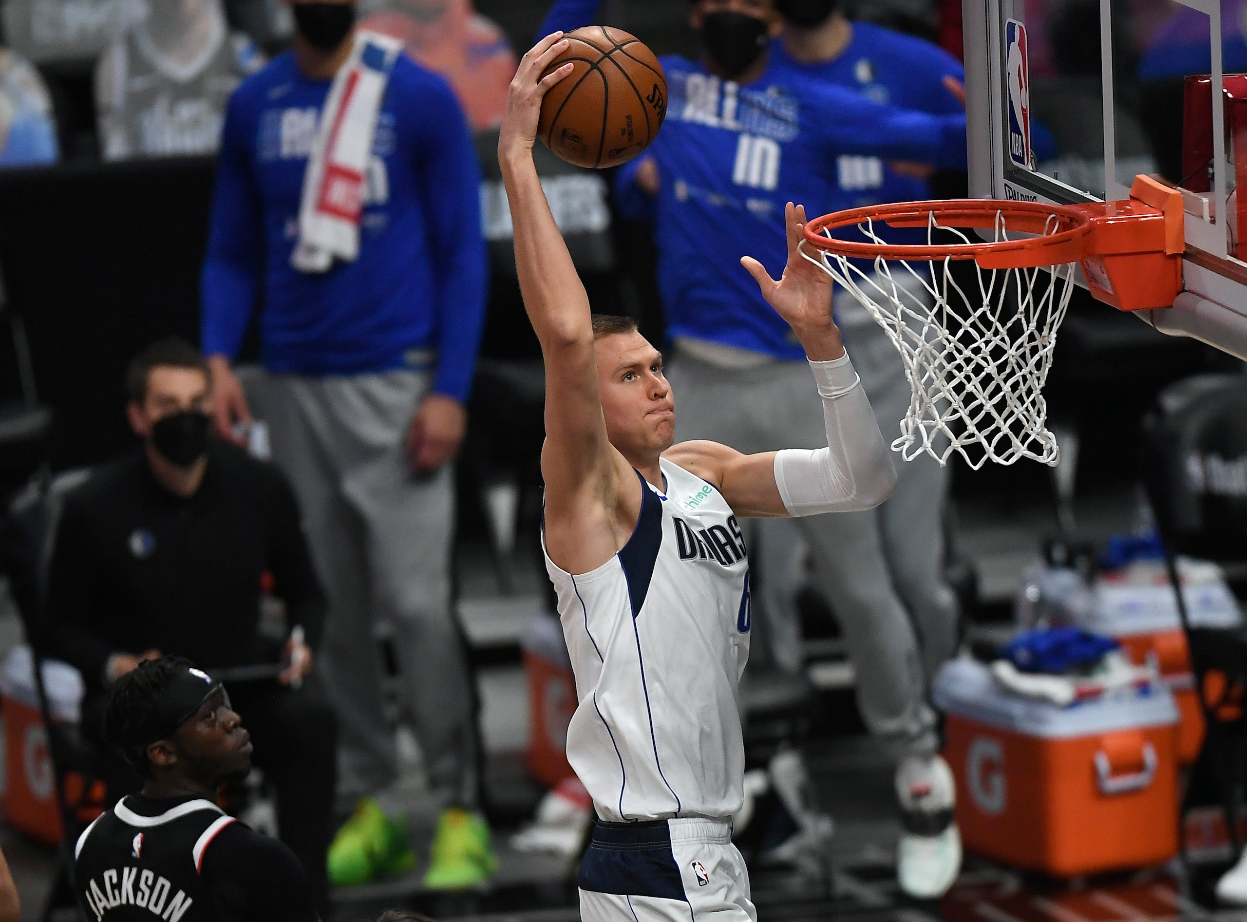 LOS ANGELES, CA - JUNE 02: Kristaps Porzingis #6 of the Dallas Mavericks scores a basket against the Los Angeles Clippers during the first half of Game Five of the Western Conference first round series at Staples Center on June 2, 2021 in Los Angeles, California. NOTE TO USER: User expressly acknowledges and agrees that, by downloading and or using this photograph, User is consenting to the terms and conditions of the Getty Images License Agreement. (Photo by Kevork Djansezian/Getty Images) LOS ANGELES, CA - JUNE 02: Kristaps Porzingis #6 of the Dallas Mavericks scores a basket against the Los Angeles Clippers during the first half of Game Five of the Western Conference first round series at Staples Center on June 2, 2021 in Los Angeles, California. NOTE TO USER: User expressly acknowledges and agrees that, by downloading and or using this photograph, User is consenting to the terms and conditions of the Getty Images License Agreement. (Photo by Kevork Djansezian/Getty Images)
