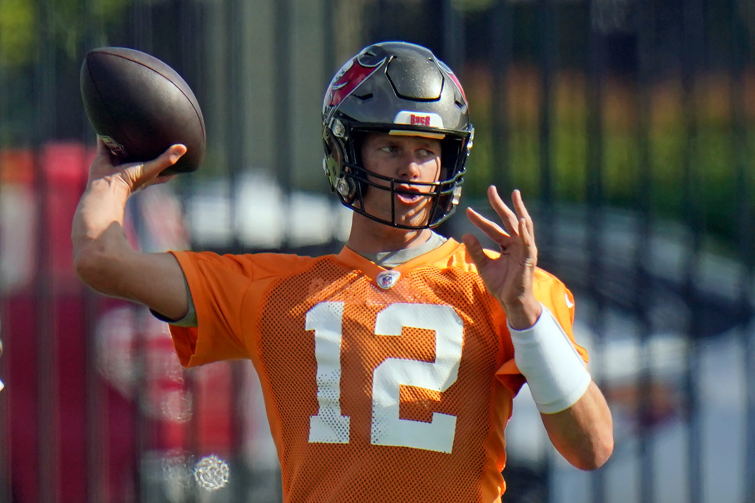 Tampa Bay Buccaneers quarterback Tom Brady (12) throws a pass during an NFL football minicamp Tuesday, June 8, 2021, in Tampa, Fla. (AP Photo/Chris O'Meara) Tampa Bay Buccaneers quarterback Tom Brady (12) throws a pass during an NFL football minicamp Tuesday, June 8, 2021, in Tampa, Fla. (AP Photo/Chris O'Meara)