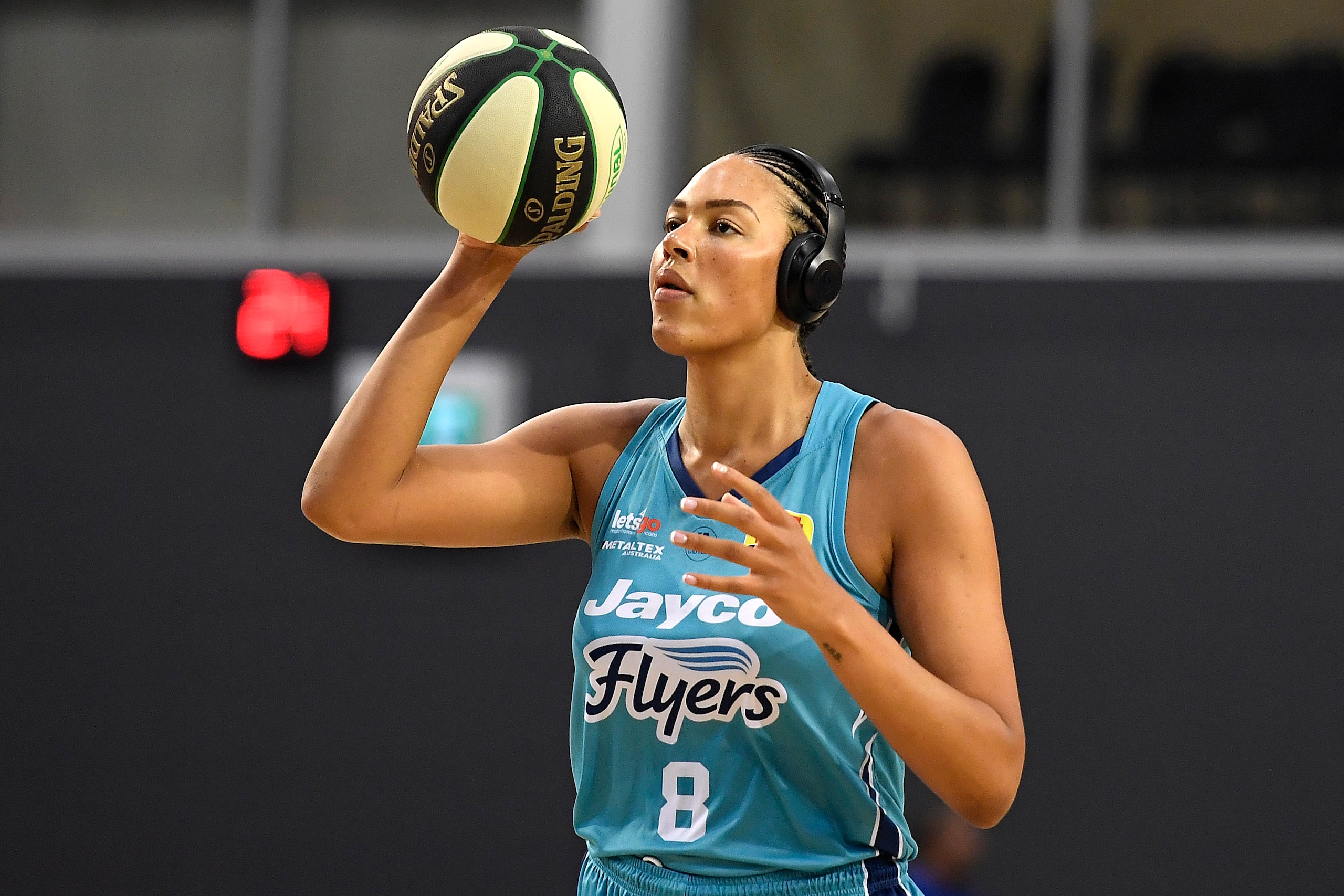 TOWNSVILLE, AUSTRALIA - DECEMBER 20: Elizabeth Cambage of the Flyers warms up during the WNBL Grand Final match between the Southside Flyers and the Townsville Fire at the Townsville Stadium, on December 20, 2020, in Townsville, Australia. (Photo by Ian Hitchcock/Getty Images)