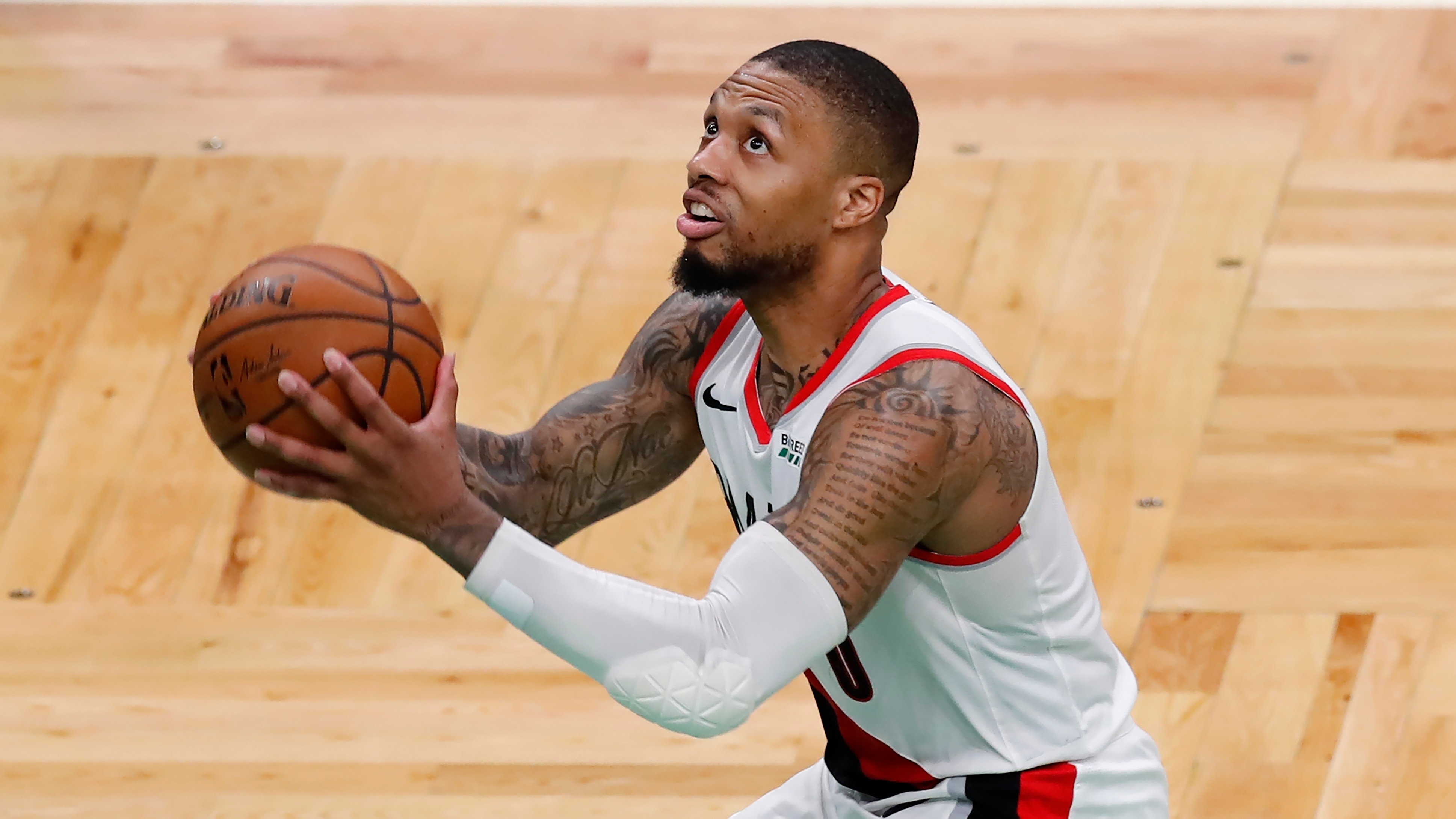Portland Trail Blazers' Damian Lillard plays against the Boston Celtics during the second half of an NBA basketball game, Sunday, May 2, 2021, in Boston. (AP Photo/Michael Dwyer)