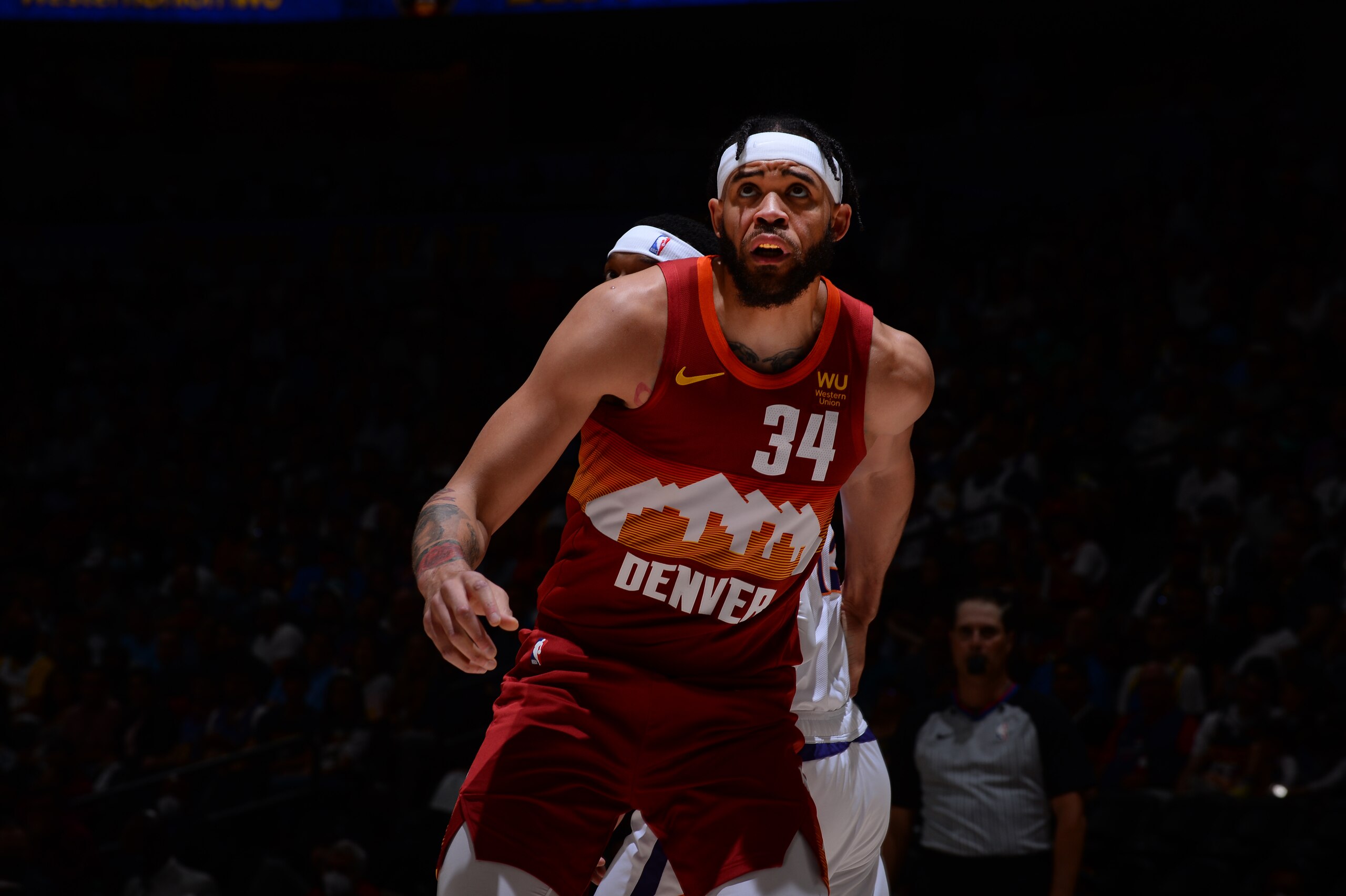 DENVER, CO - JUNE 13: JaVale McGee #34 of the Denver Nuggets looks on against the Phoenix Suns during Round 2, Game 4 of the 2021 NBA Playoffs on June 13, 2021 at the Ball Arena in Denver, Colorado. NOTE TO USER: User expressly acknowledges and agrees that, by downloading and/or using this Photograph, user is consenting to the terms and conditions of the Getty Images License Agreement. Mandatory Copyright Notice: Copyright 2021 NBAE (Photo by Bart Young/NBAE via Getty Images)