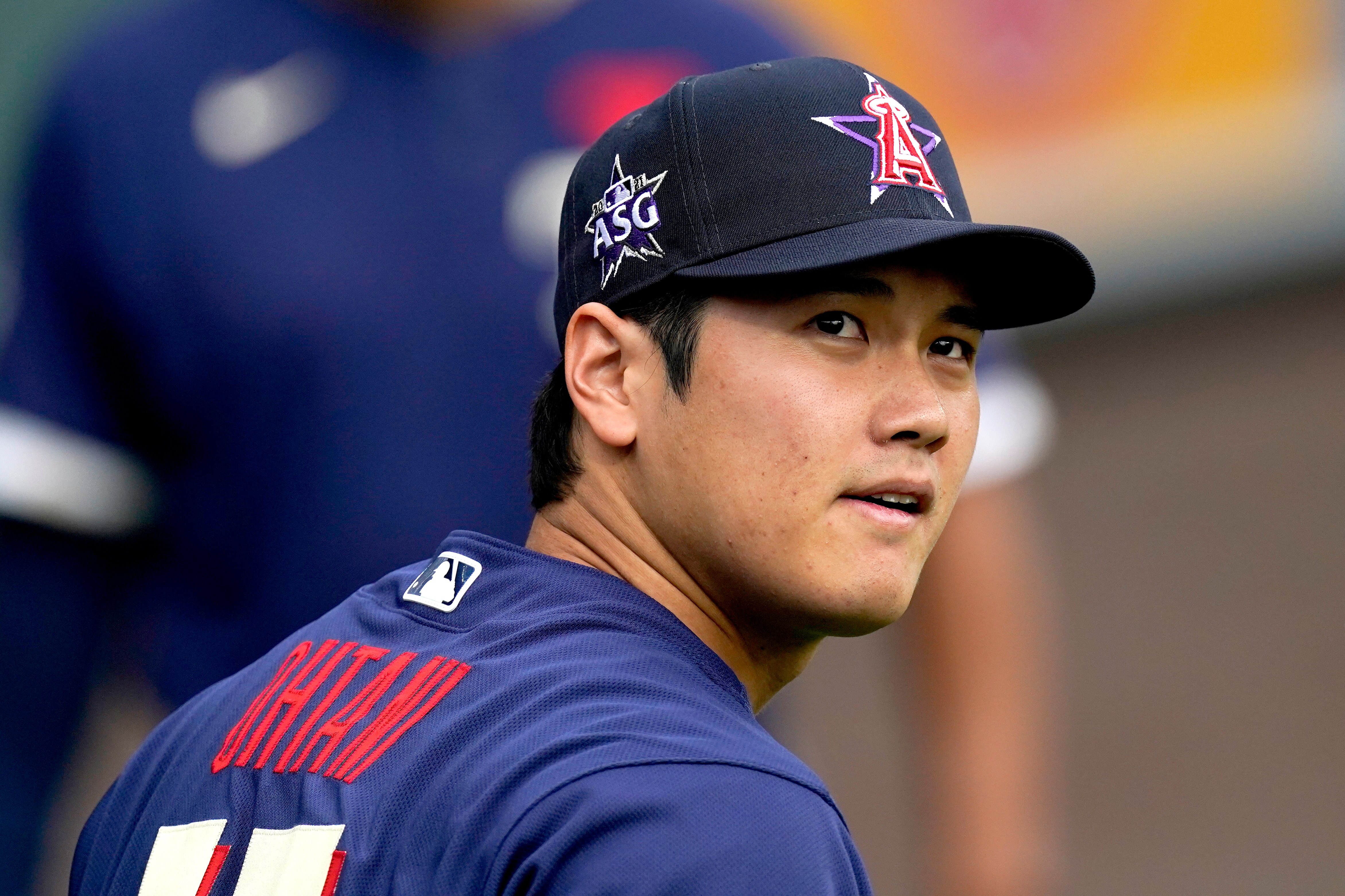 American League's Shohei Ohtani, of the Los Angeles Angeles, looks towards the crowd prior to the MLB All-Star baseball game, Tuesday, July 13, 2021, in Denver. (AP Photo/Gabriel Christus)