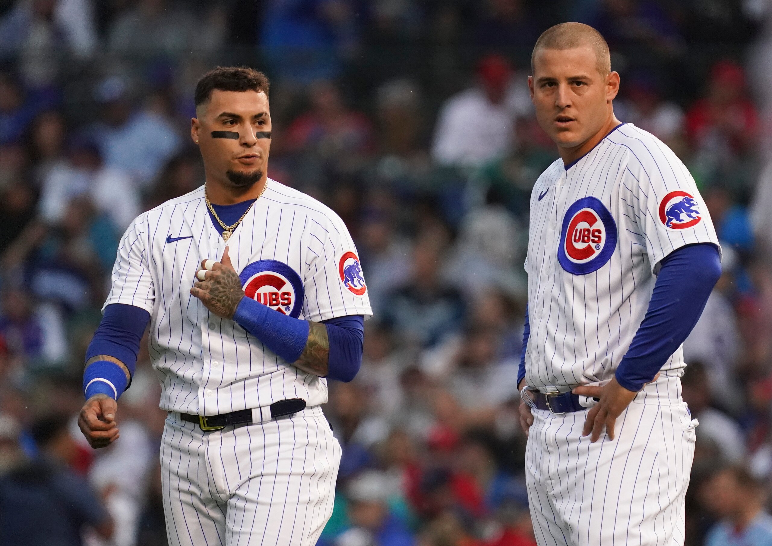 CHICAGO, ILLINOIS - JULY 10: Javier Baez #9 and Anthony Rizzo #44 of the Chicago Cubs react after the first inning against the St. Louis Cardinals at Wrigley Field on July 10, 2021 in Chicago, Illinois. (Photo by Nuccio DiNuzzo/Getty Images) CHICAGO, ILLINOIS - JULY 10: Javier Baez #9 and Anthony Rizzo #44 of the Chicago Cubs react after the first inning against the St. Louis Cardinals at Wrigley Field on July 10, 2021 in Chicago, Illinois. (Photo by Nuccio DiNuzzo/Getty Images)