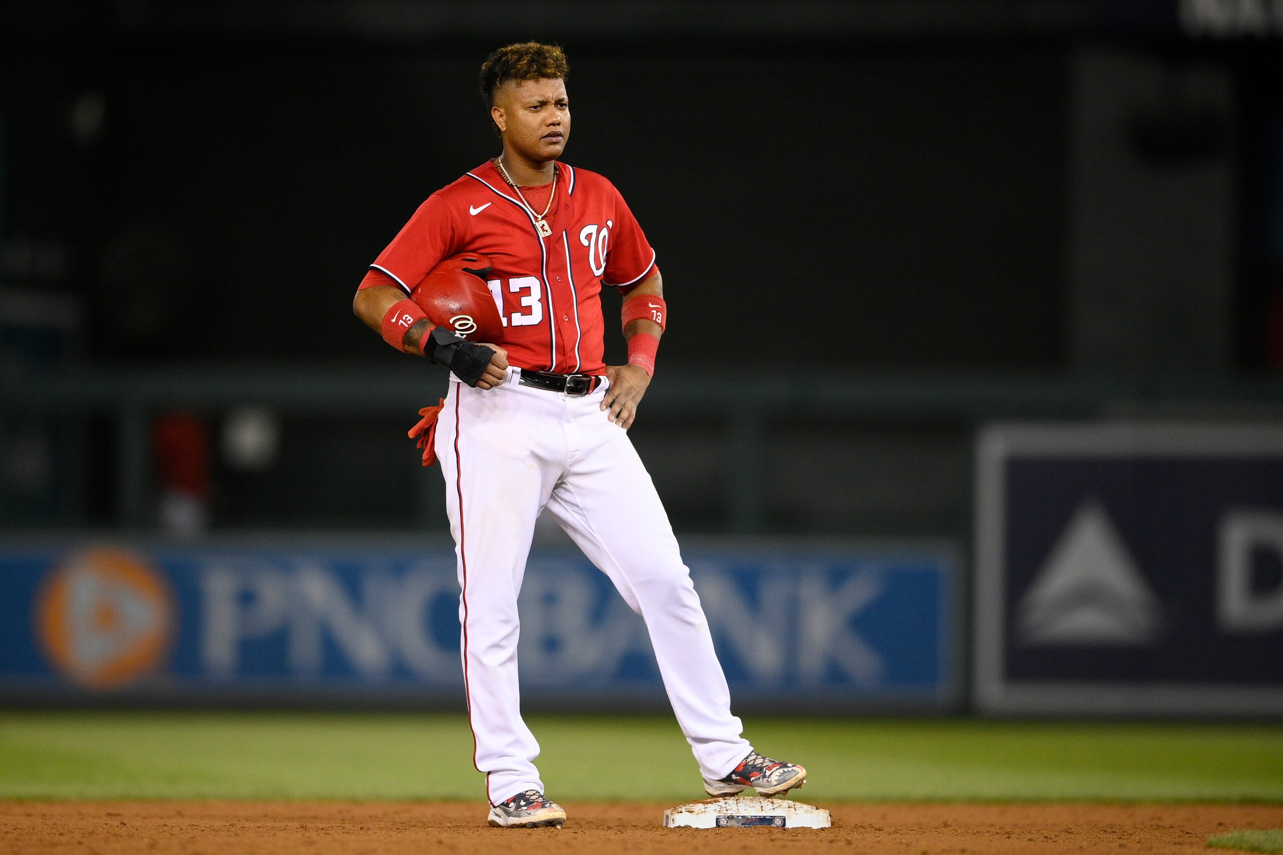 Washington Nationals' Starlin Castro stands on the field during a baseball game against the Los Angeles Dodgers, early Sunday, July 4, 2021, in Washington. (AP Photo/Nick Wass)