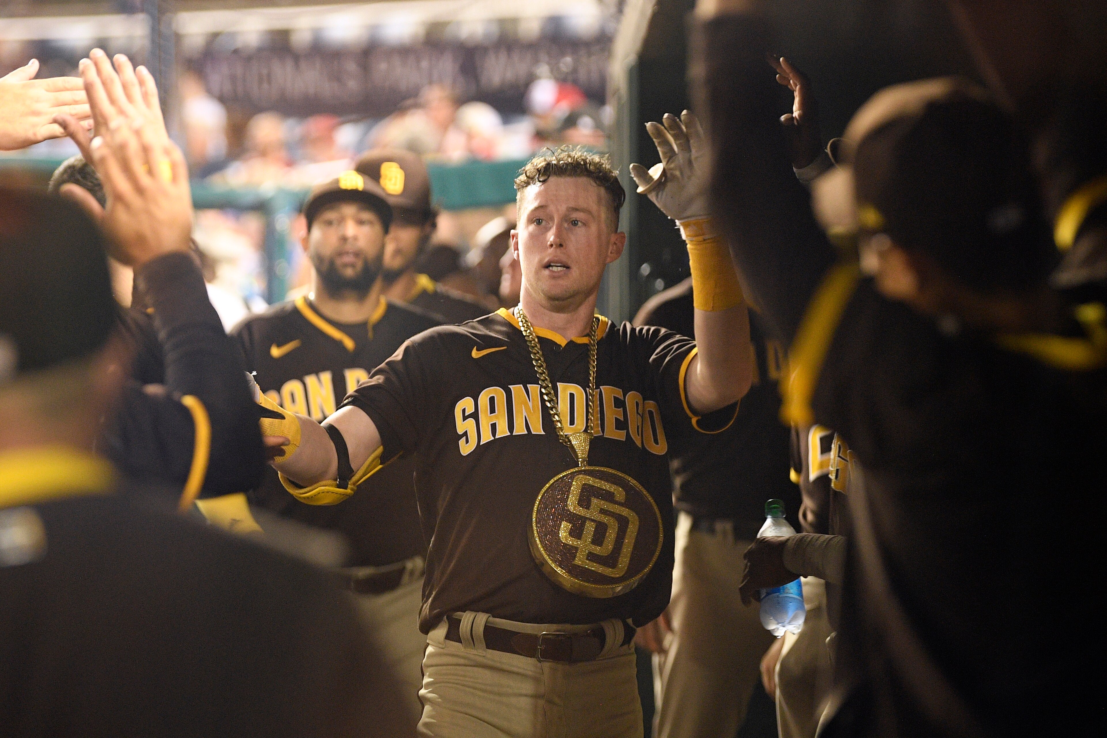 San Diego Padres' Jake Cronenworth celebrates in the dugout after his home run during the fifth inning of a baseball game against the Washington Nationals, Friday, July 16, 2021, in Washington. (AP Photo/Nick Wass) San Diego Padres' Jake Cronenworth celebrates in the dugout after his home run during the fifth inning of a baseball game against the Washington Nationals, Friday, July 16, 2021, in Washington. (AP Photo/Nick Wass)